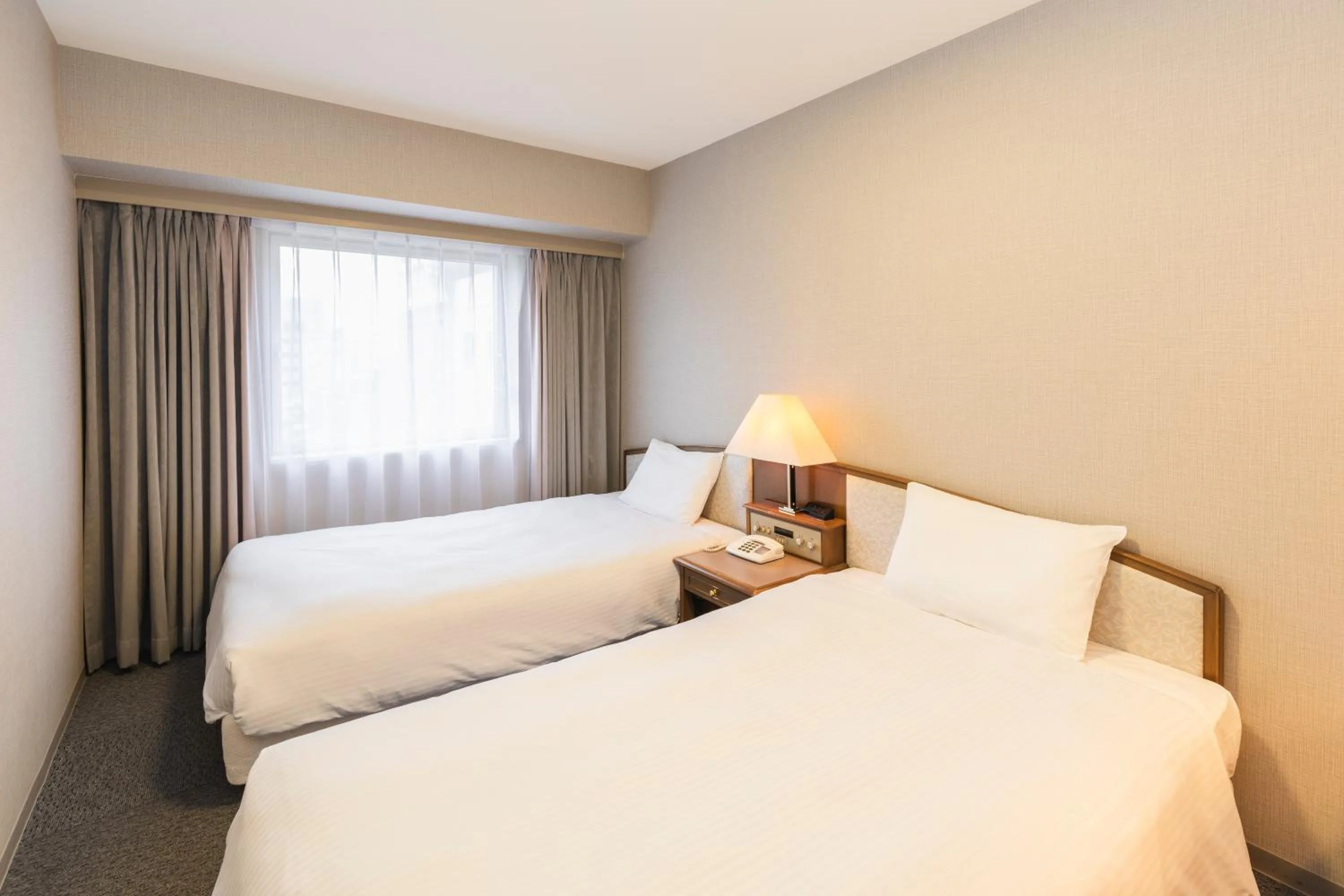 Economy Twin Room - Smoking in Hotel Sunroute Niigata