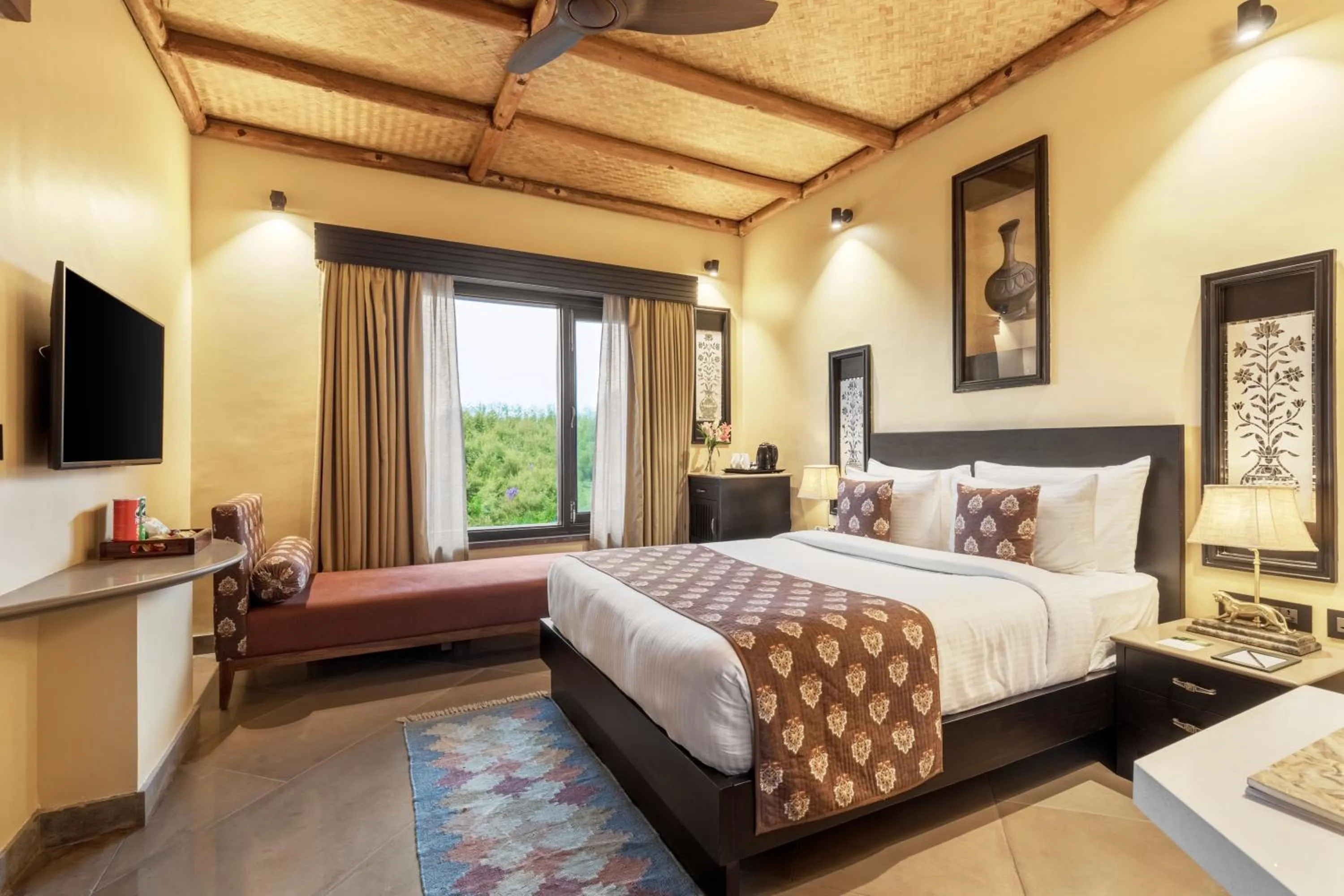Evoke King Room -15% Discount on F&B,Spa & Laundary,Early check in & Late check out by 2 Hours ( subject to availability ). Hi-Tea included with activities & Folk Music . in AamaGhati Wildlife Resort, Ranthambore