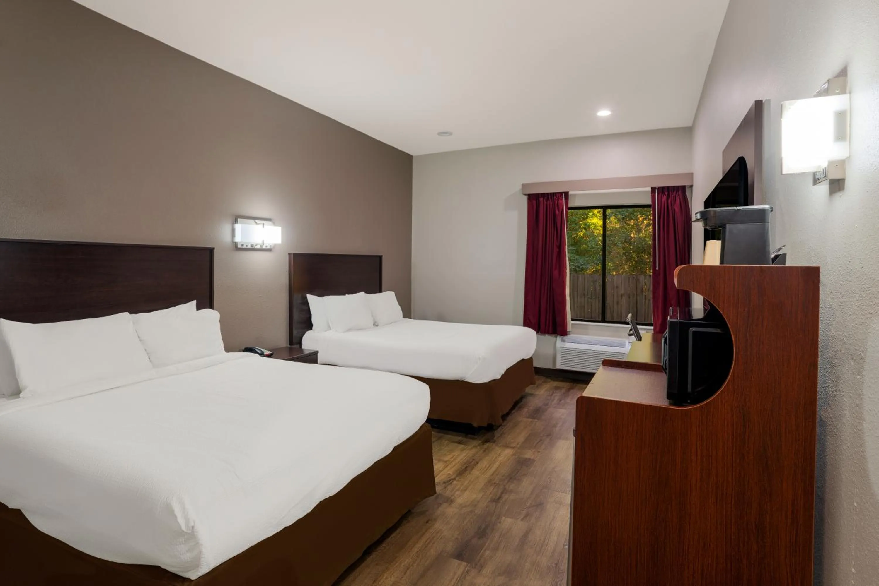 Quadruple Room with Two Queen Beds - Non Smoking/Interior Hall in Rodeway Inn