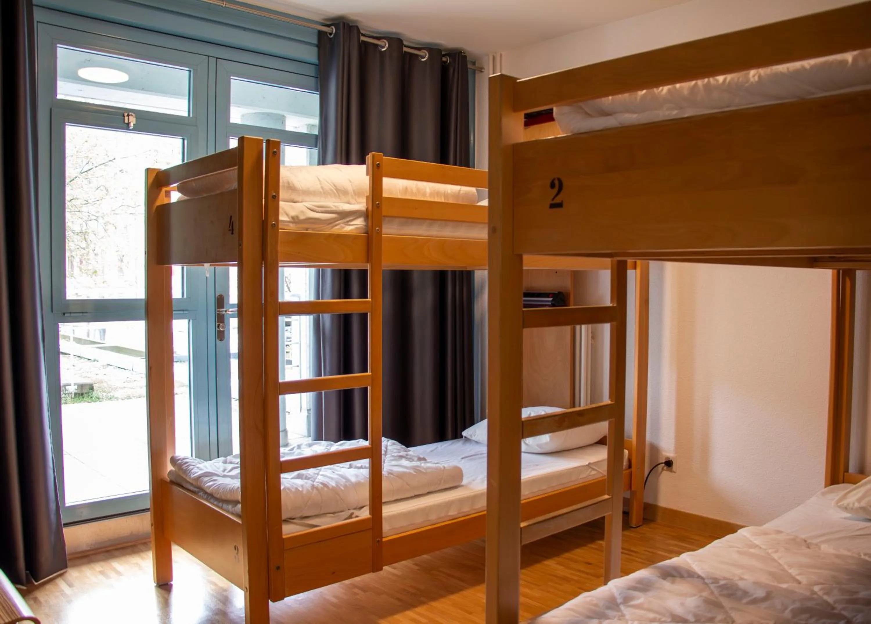 Quadruple Room with Shared Bathroom in Geneva Hostel
