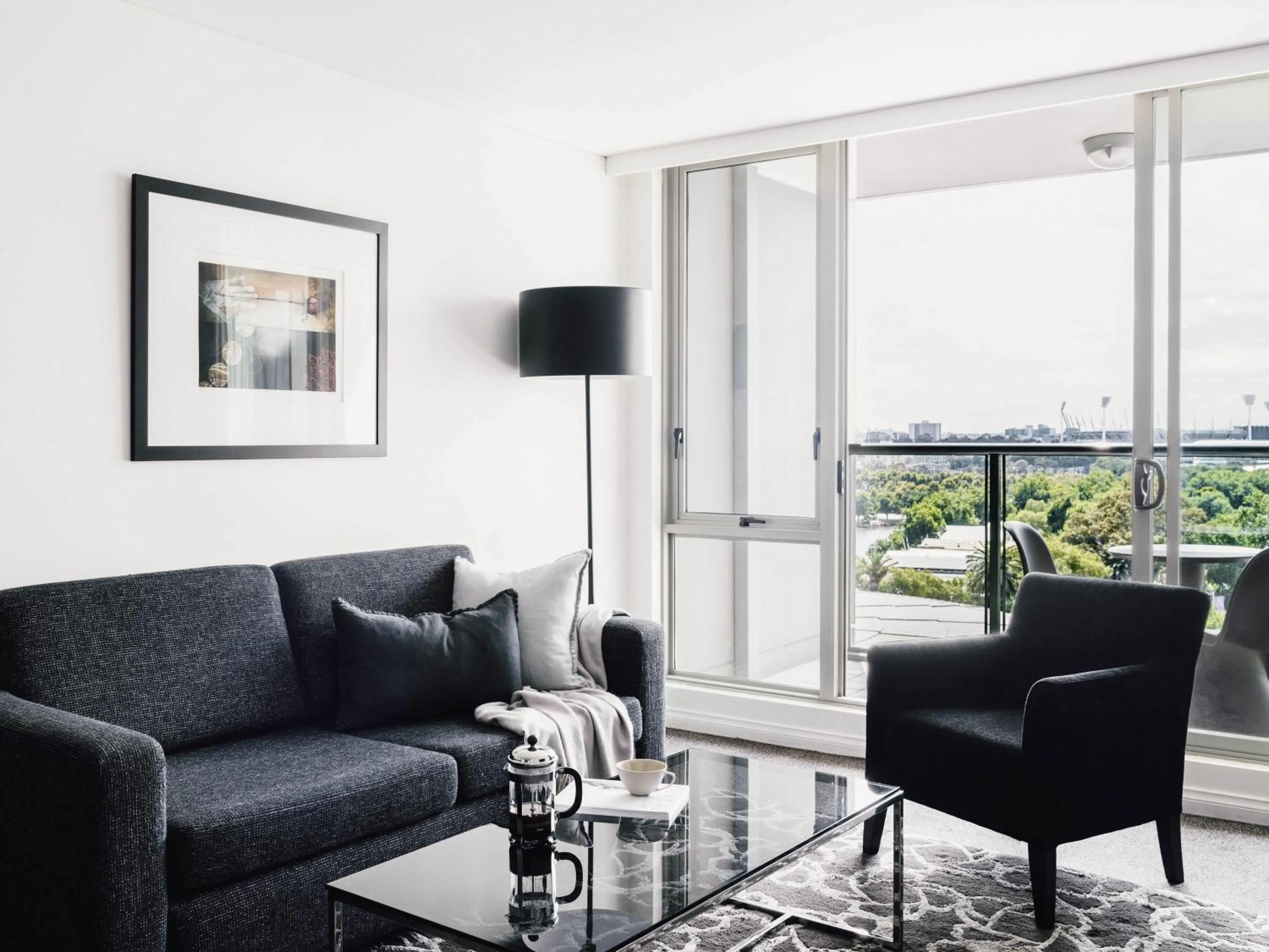 One-Bedroom Deluxe Suite with Balcony - Floors 10-15 in Quay West Suites Melbourne