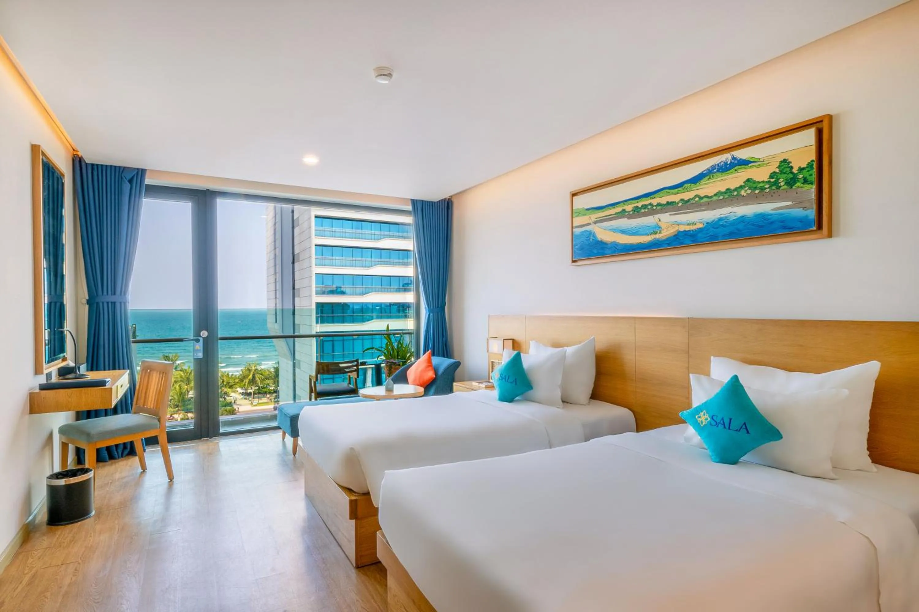 Deluxe Twin Room with Partial Sea View in Sala Danang Beach Hotel