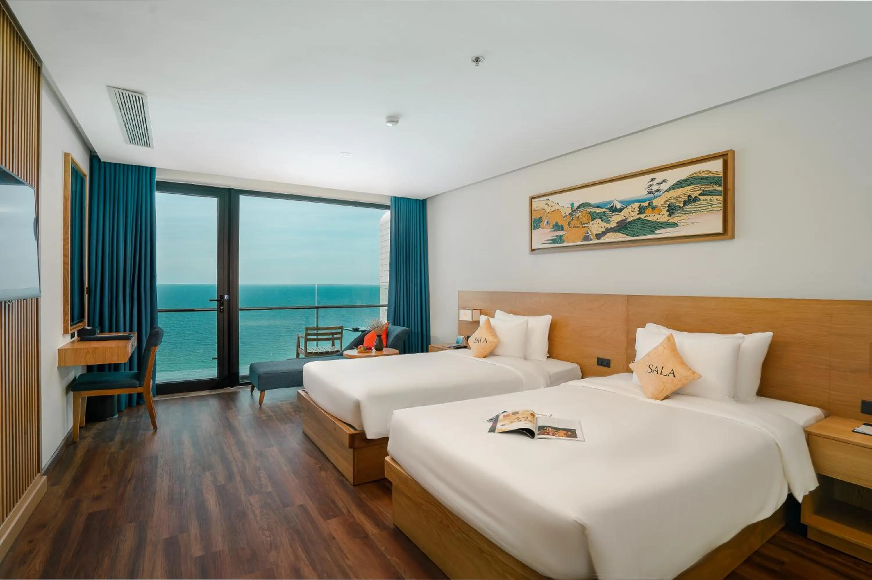 Deluxe Twin Room with Balcony and Sea View in Sala Danang Beach Hotel