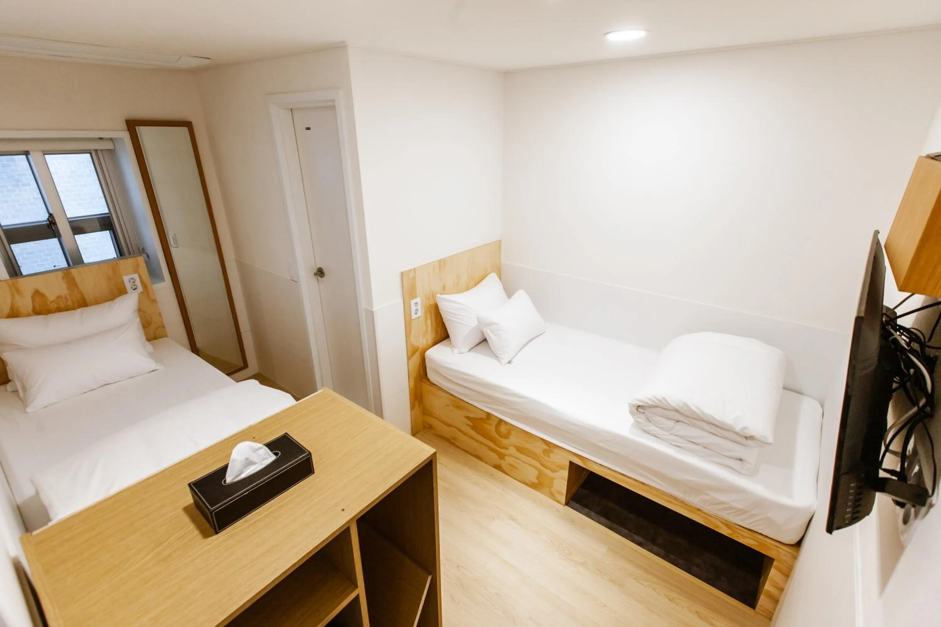Twin Room in Seoulite Inn Myeongdong Formerly - Step Inn Myeongdong 2