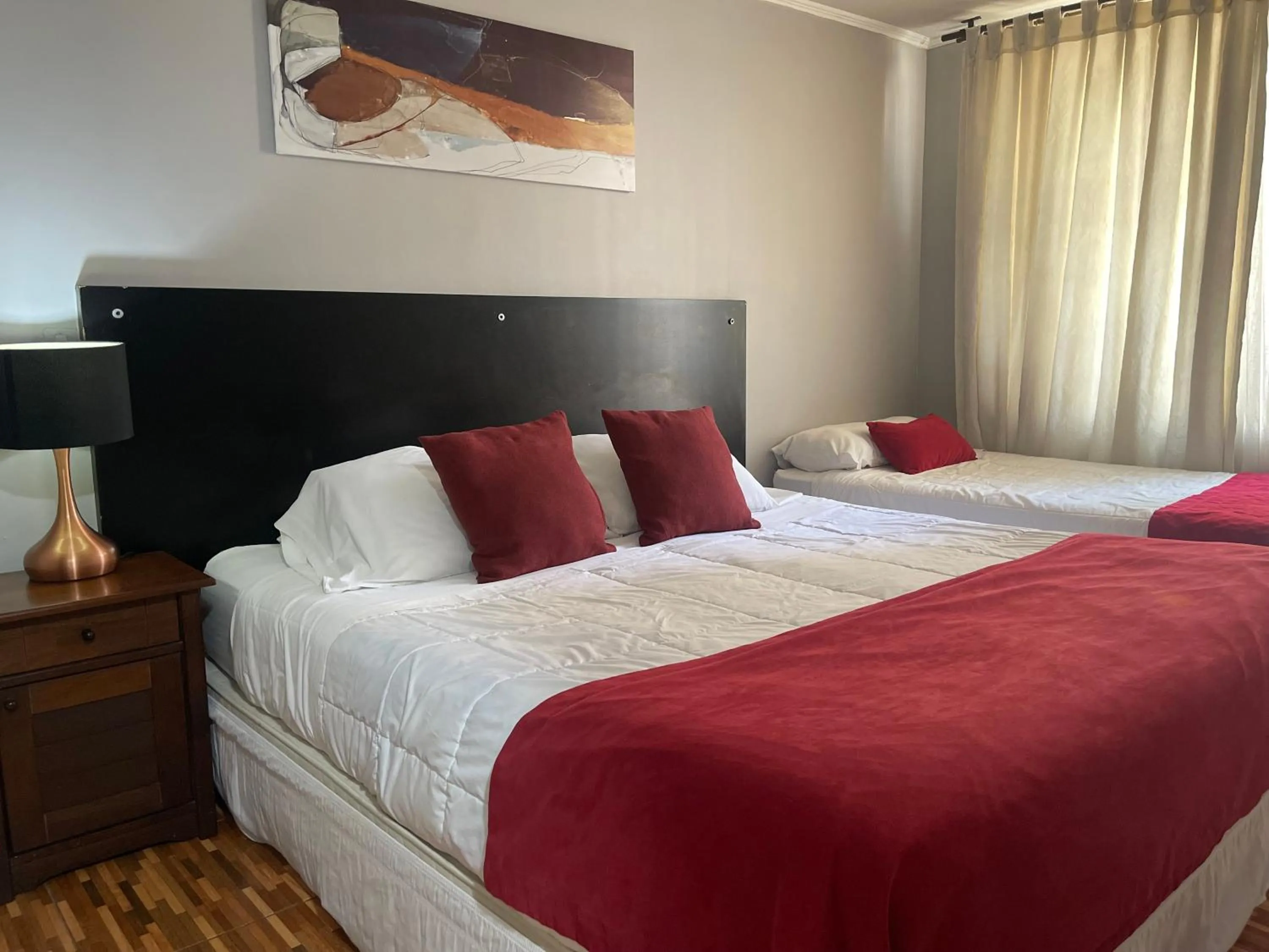 Quadruple Room with Private Bathroom in VR Suite Santiago