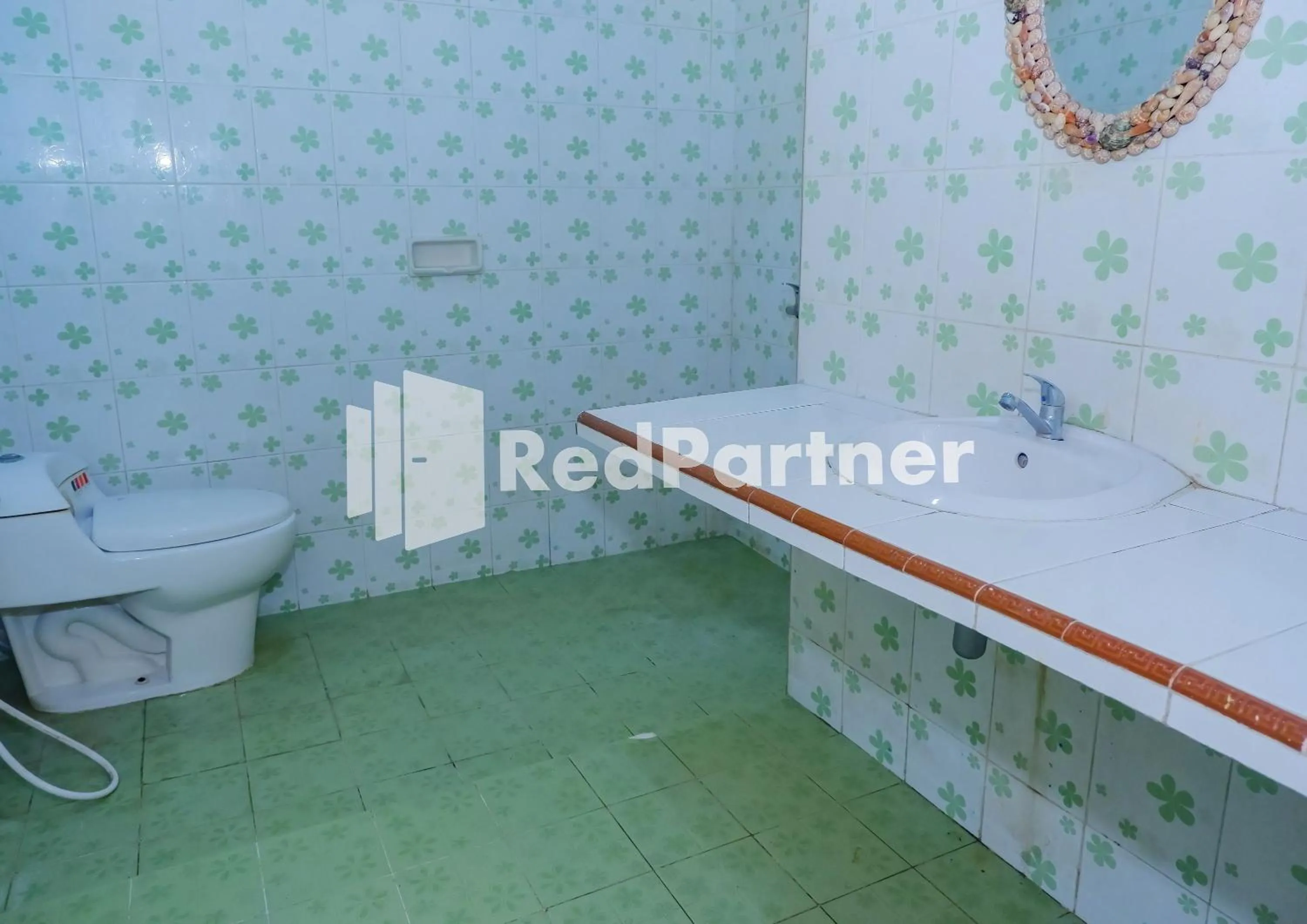 Family Room in MS Hotel Pangandaran Mitra RedDoorz