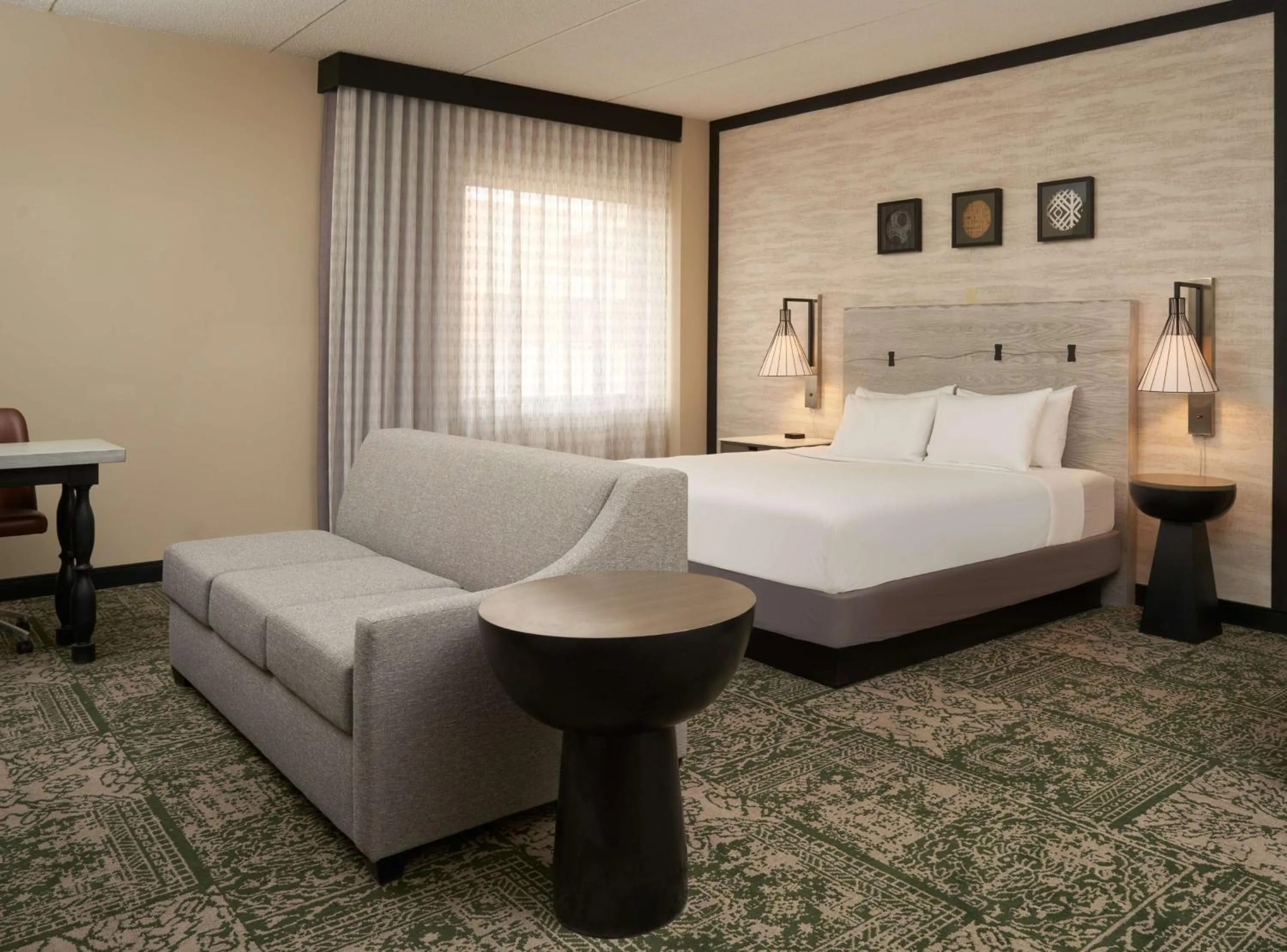 Junior King Suite with Seating Area in Hilton Appleton Paper Valley