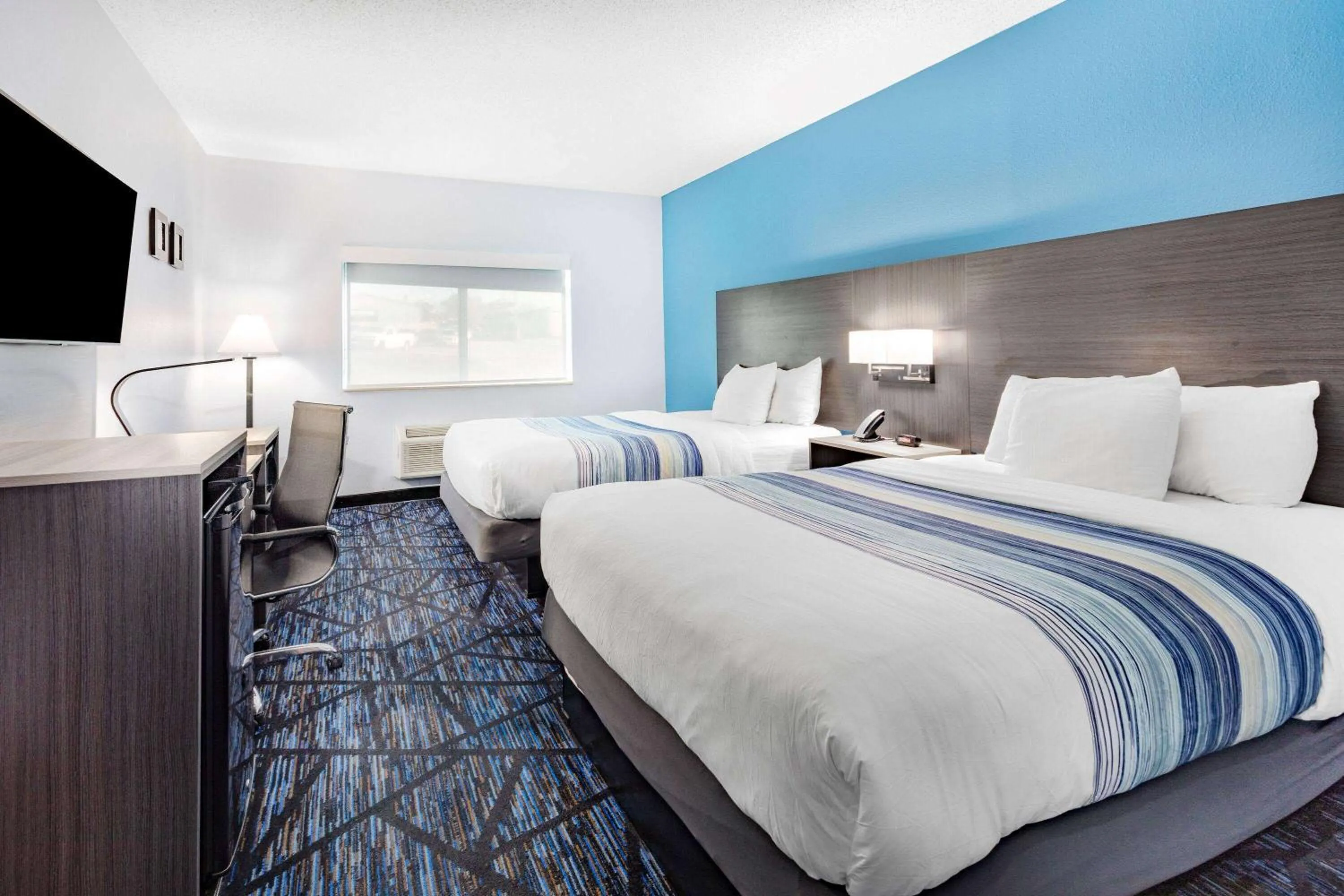 Queen Room with Two Queen Beds - Non-Smoking in AmericInn by Wyndham Quincy
