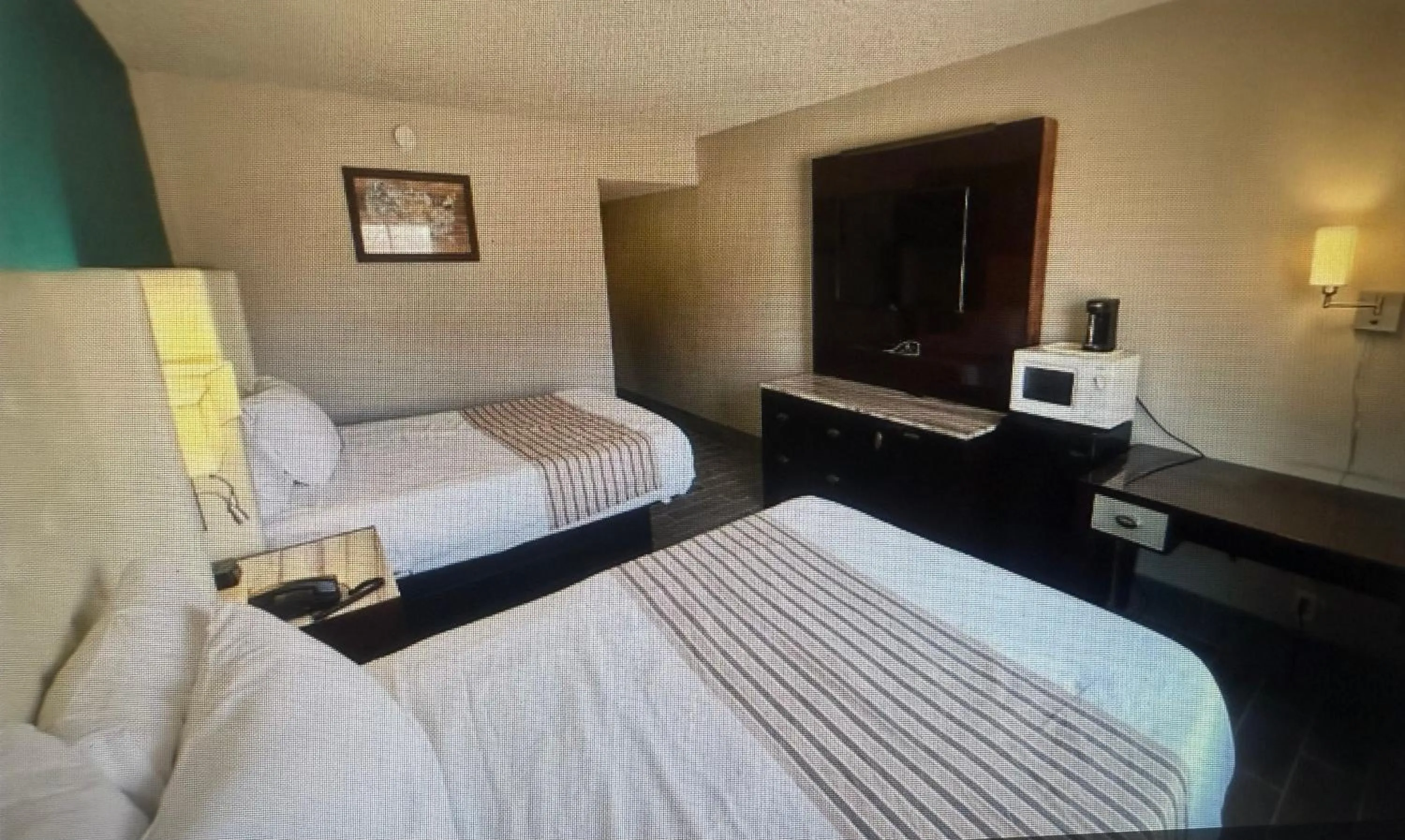 Quadruple Room with Two Queen Beds - Non Smoking/Pet Friendly in Rodeway Inn