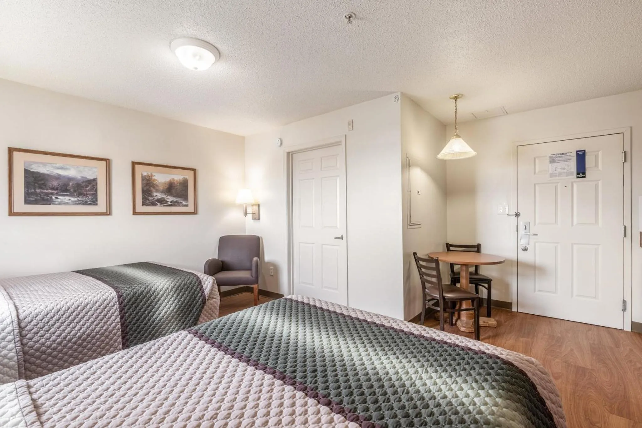 Studio Room with Two Double Beds Disability Access Non-Smoking   in HomeTowne Studios & Suites by Red Roof Charlotte - Concord