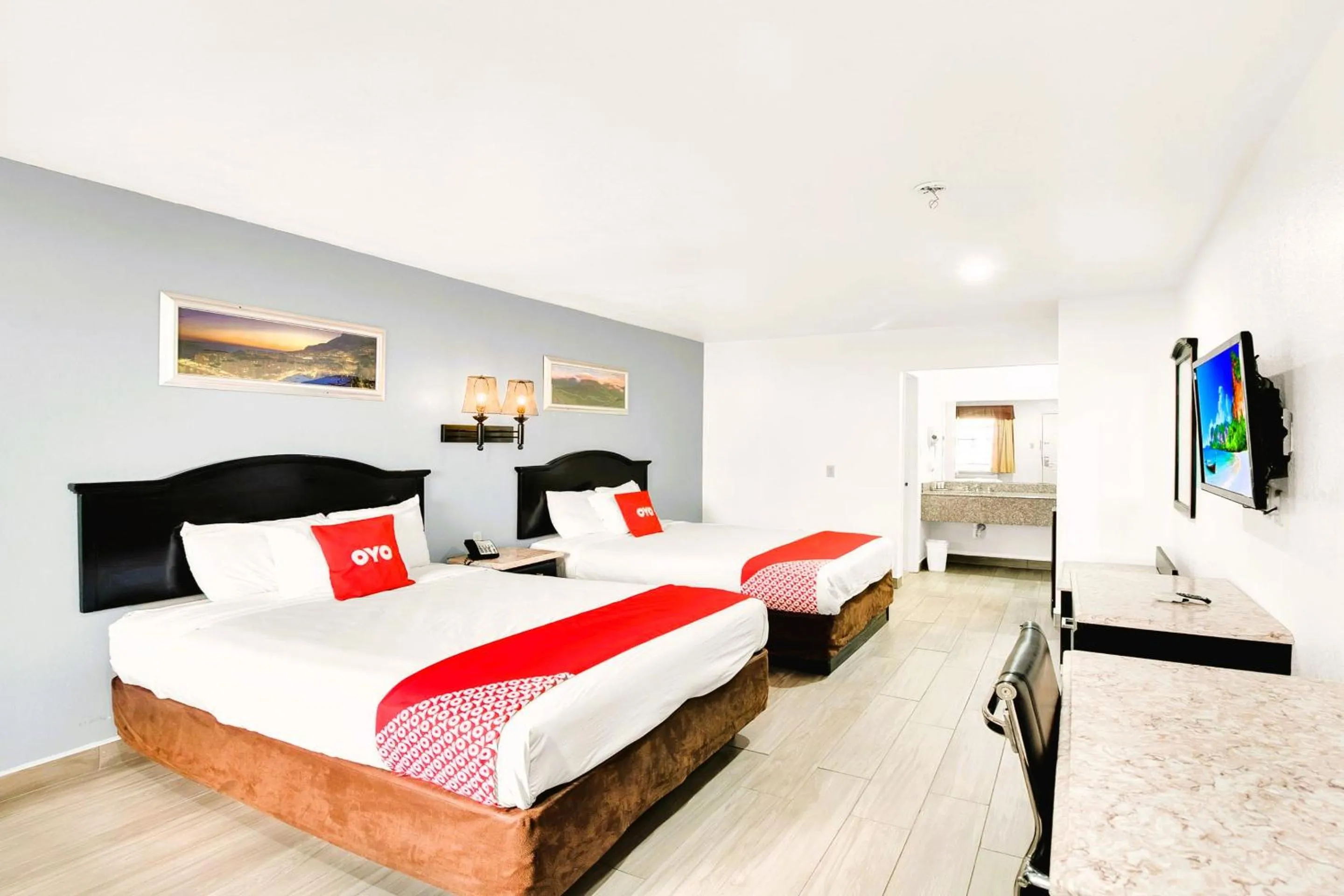 Queen Room with Two Queen Beds in Three Rivers Executive Inn & Suites By OYO