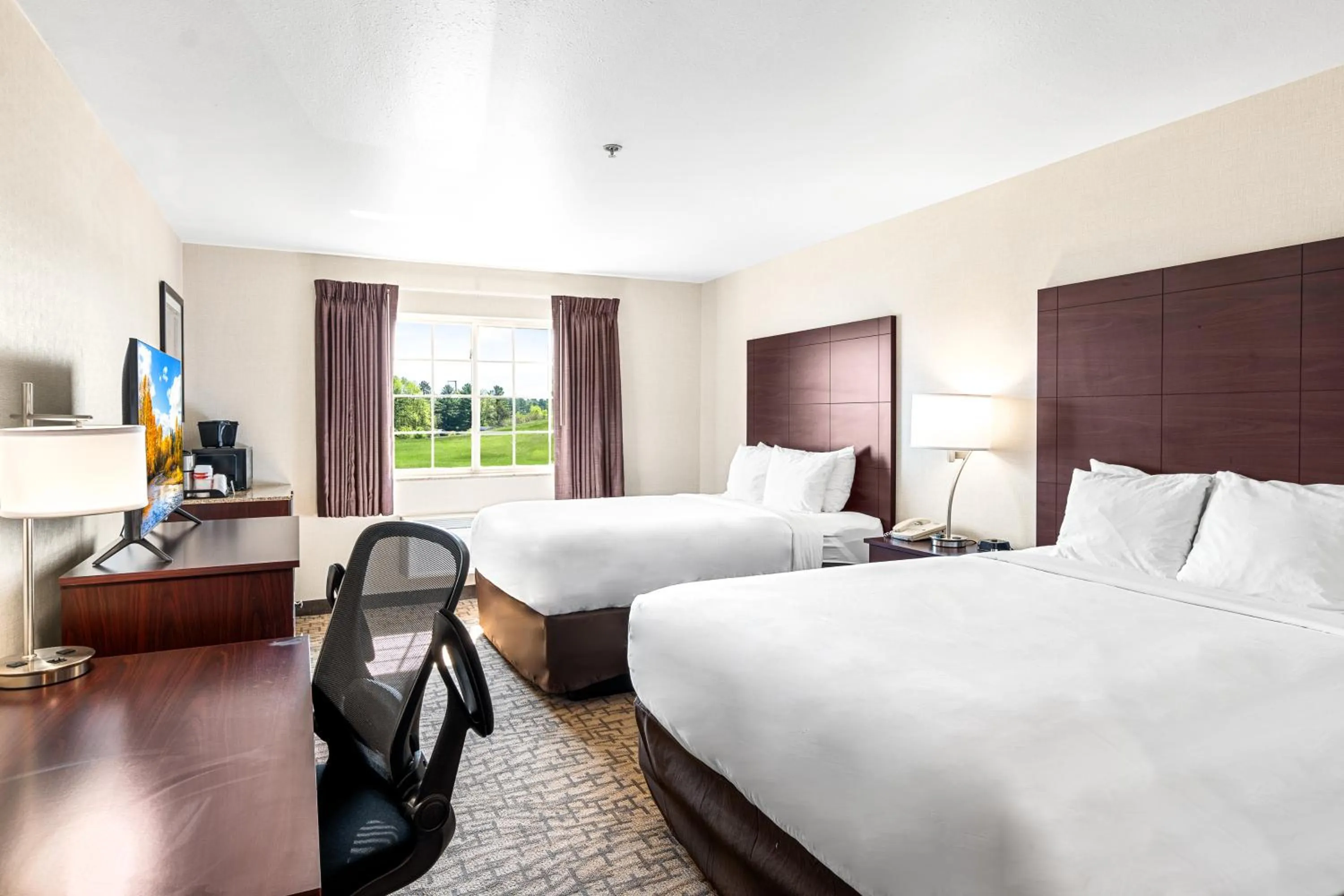 Queen Room with Two Queen Beds - Non-Smoking in Boarders Inn & Suites by Cobblestone Hotels - Shawano