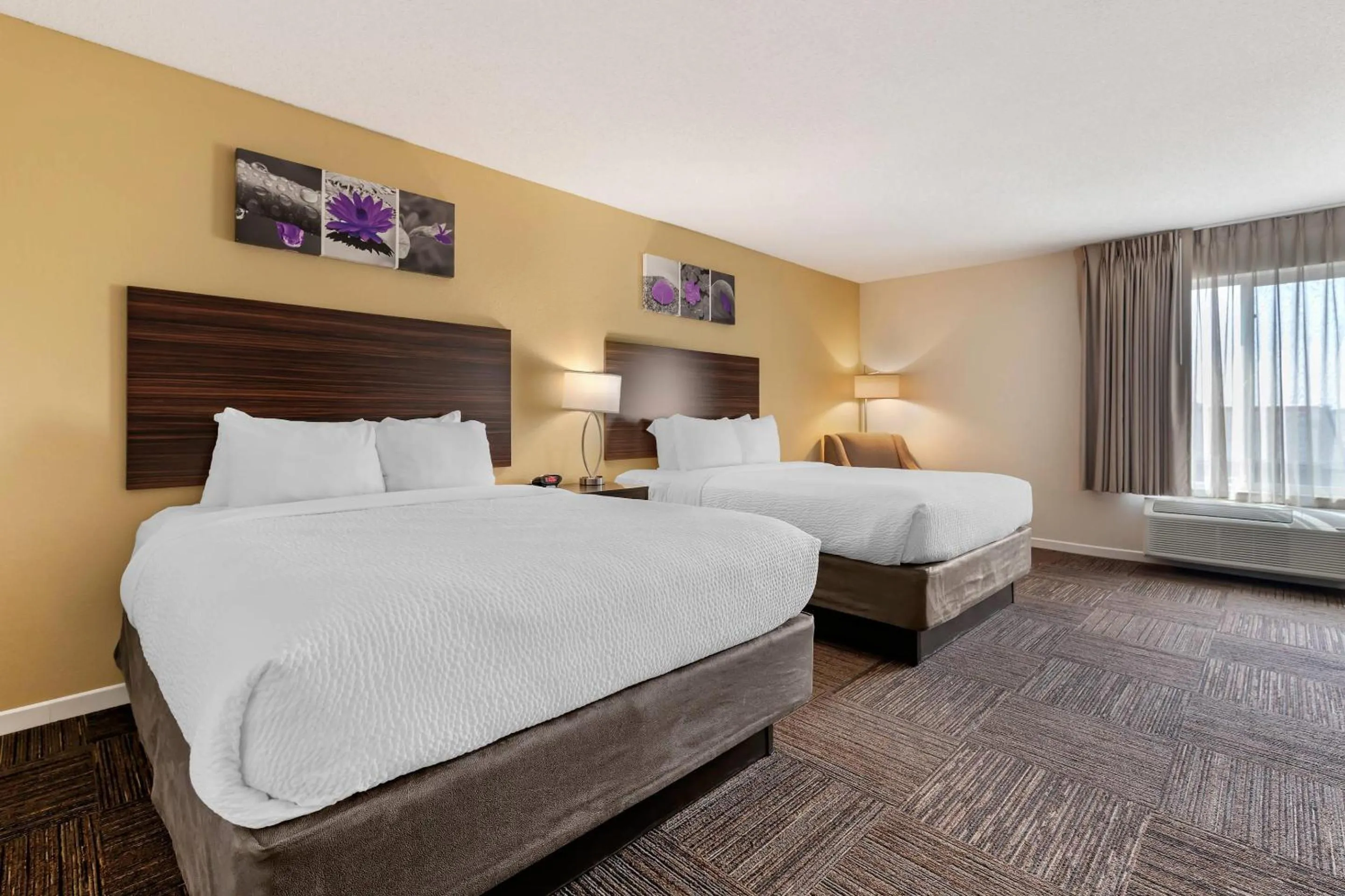 Queen Room with Two Queen Beds - Non-Smoking in Sleep Inn & Suites Wisconsin Rapids