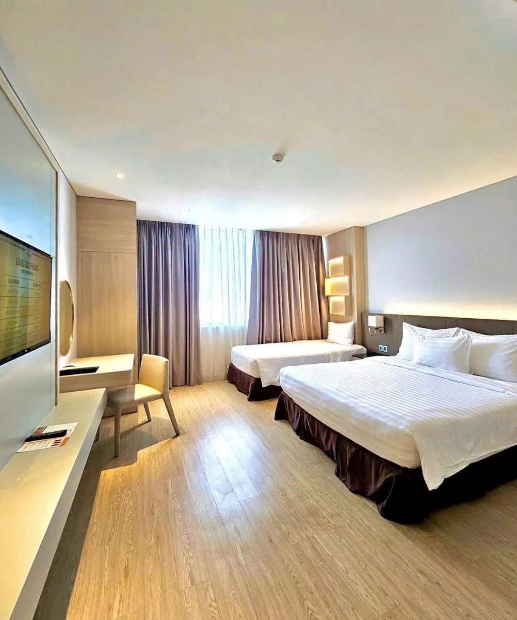 Deluxe Triple Room in DQua Hotel