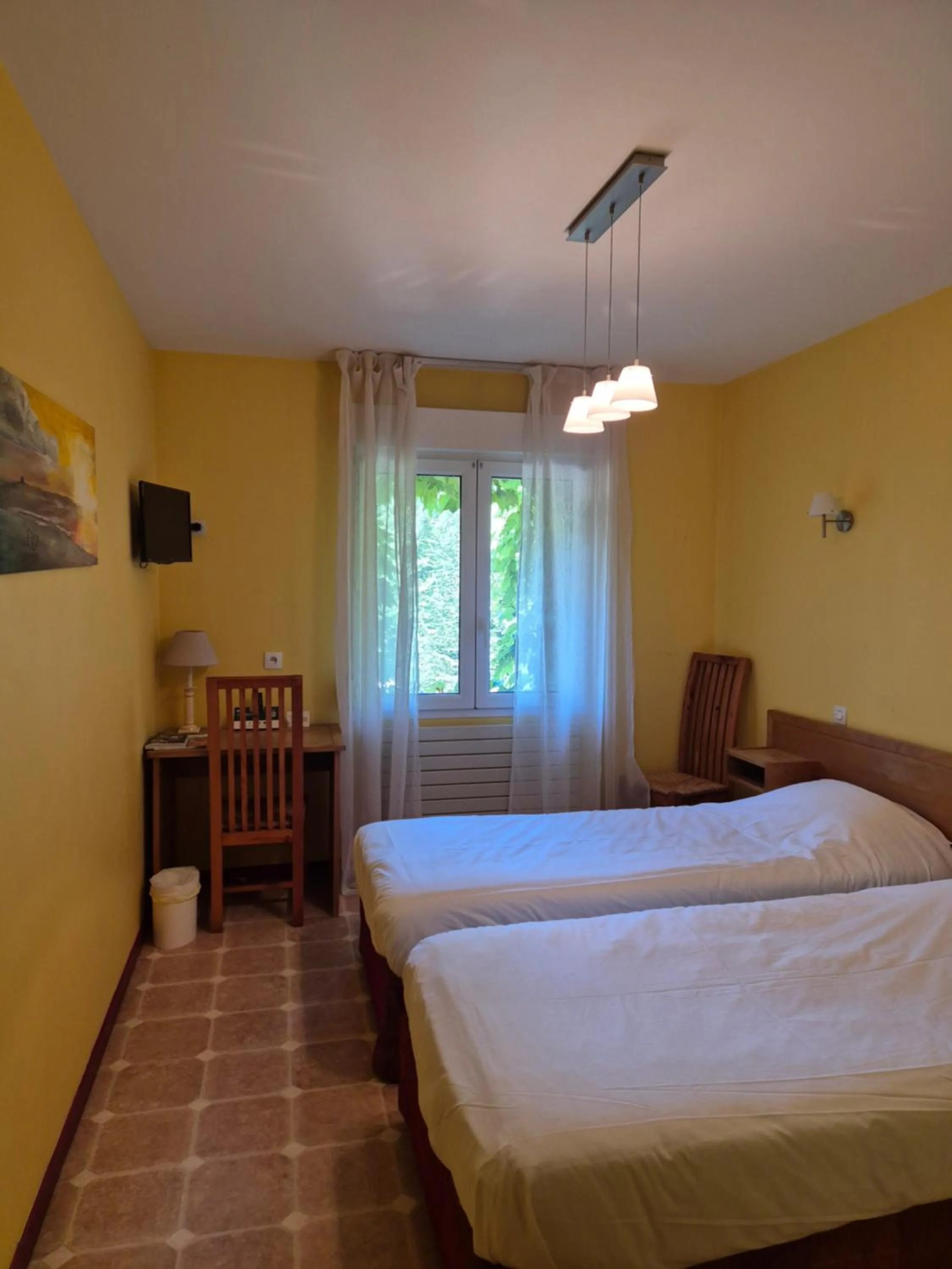Standard Twin Room in Logis Hôtel Restaurant Les Norias