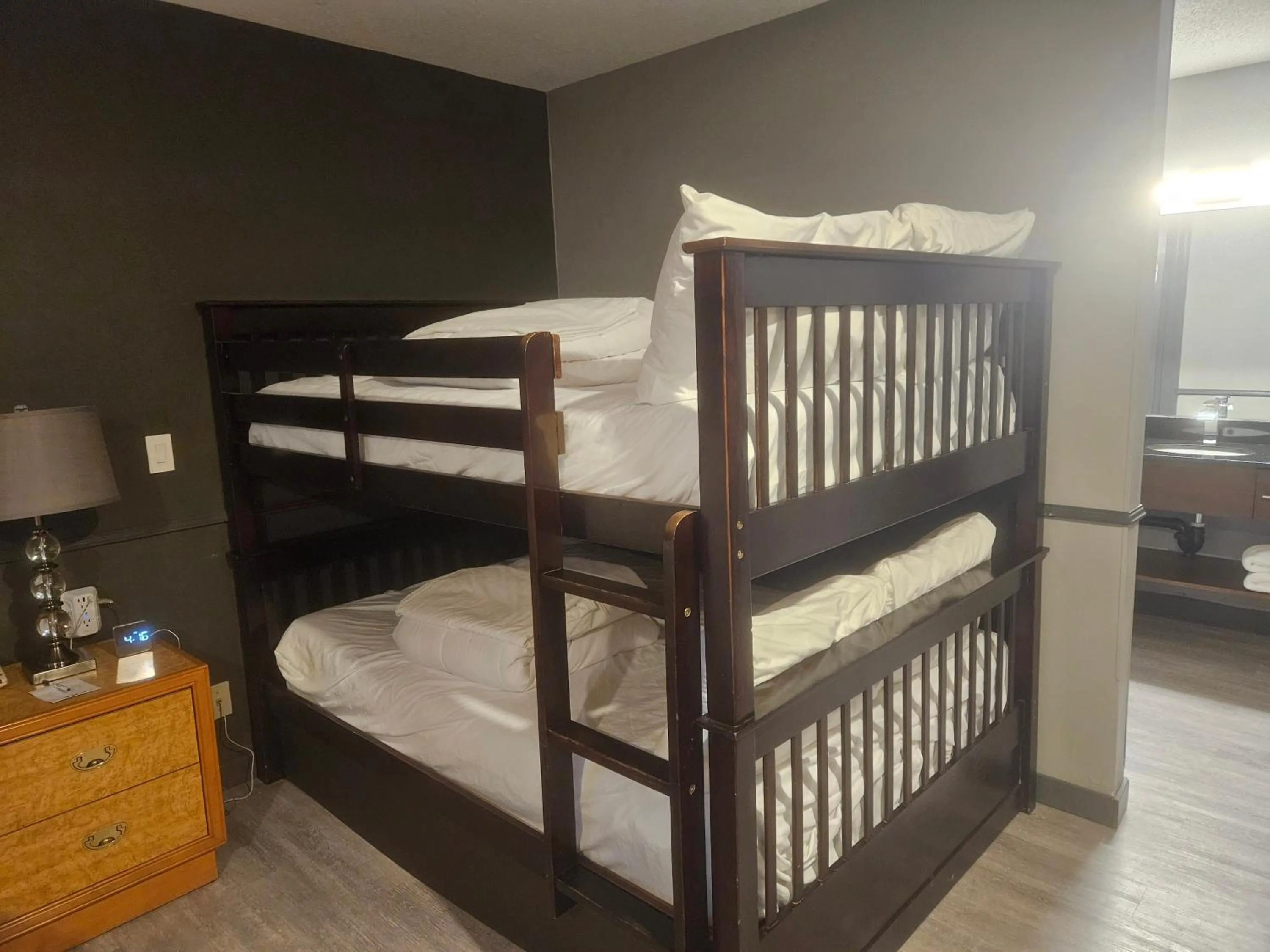 Exterior Entrance Family Room with One Queen Bed and Bunk Beds - Non-Smoking in Travelodge by Wyndham Brandon