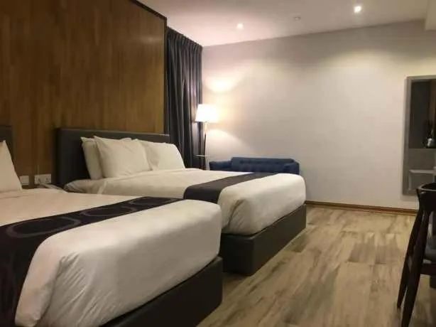 Deluxe Triple Room in Frame Hotel