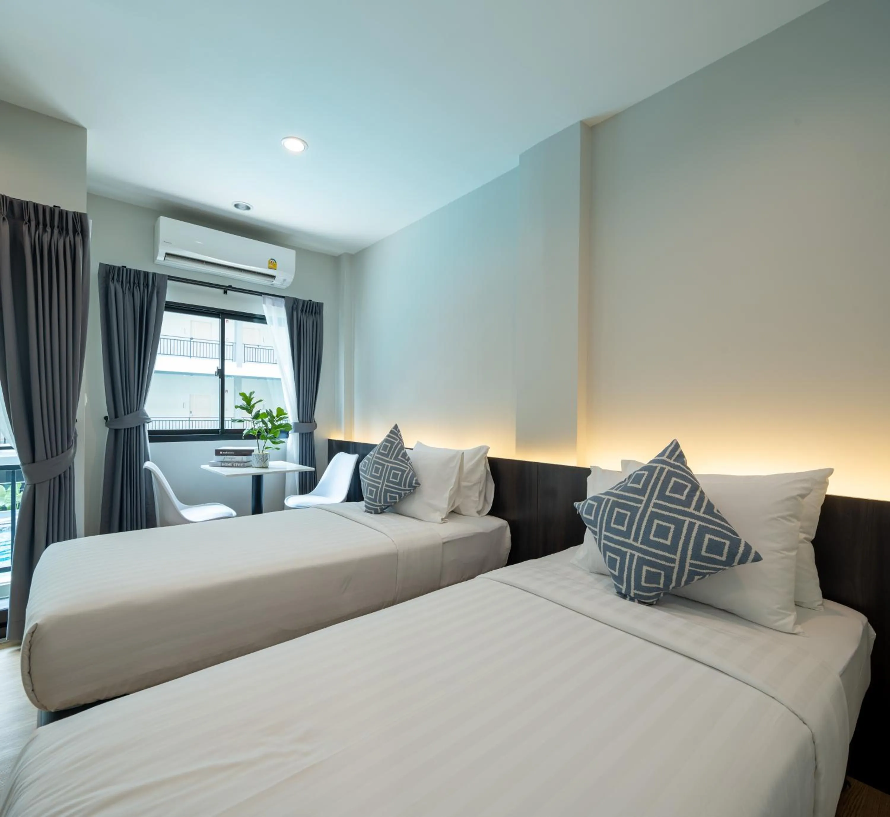 Twin Room with Pool View in College Haus Rangnam