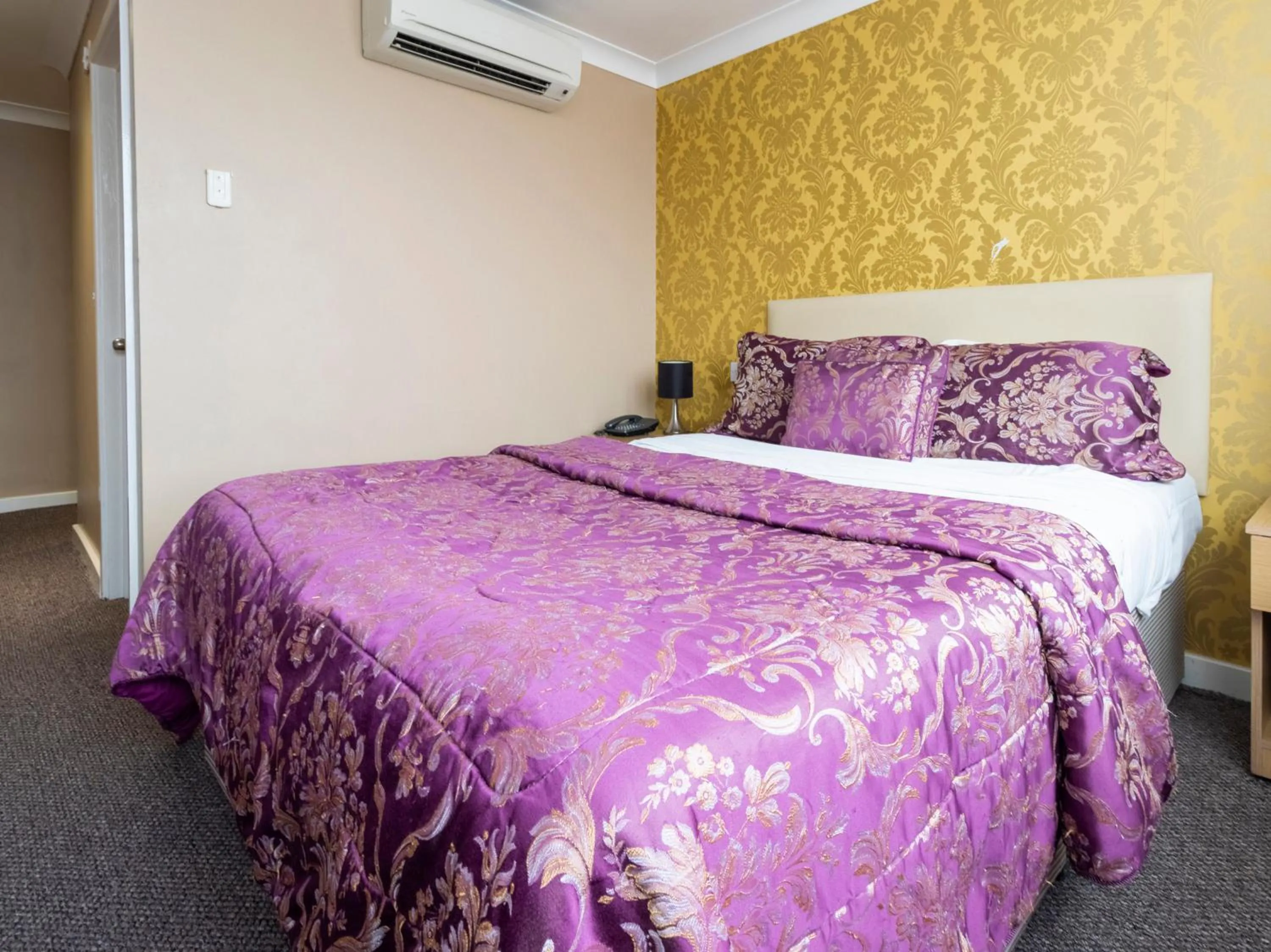 Standard Triple Room in Stuart Hotel