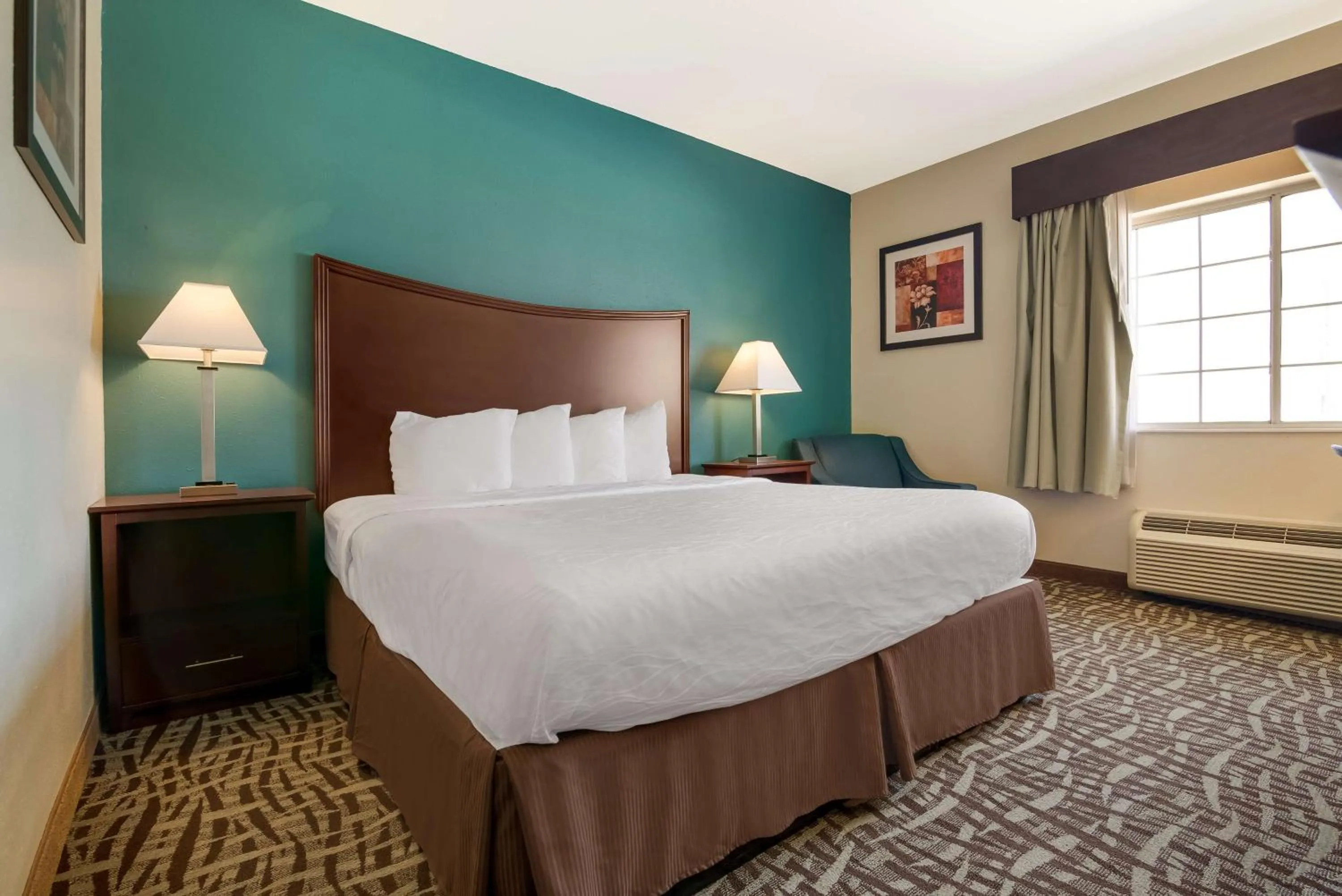 Economy King Room - Non-Smoking in SureStay Plus Hotel by Best Western Topeka