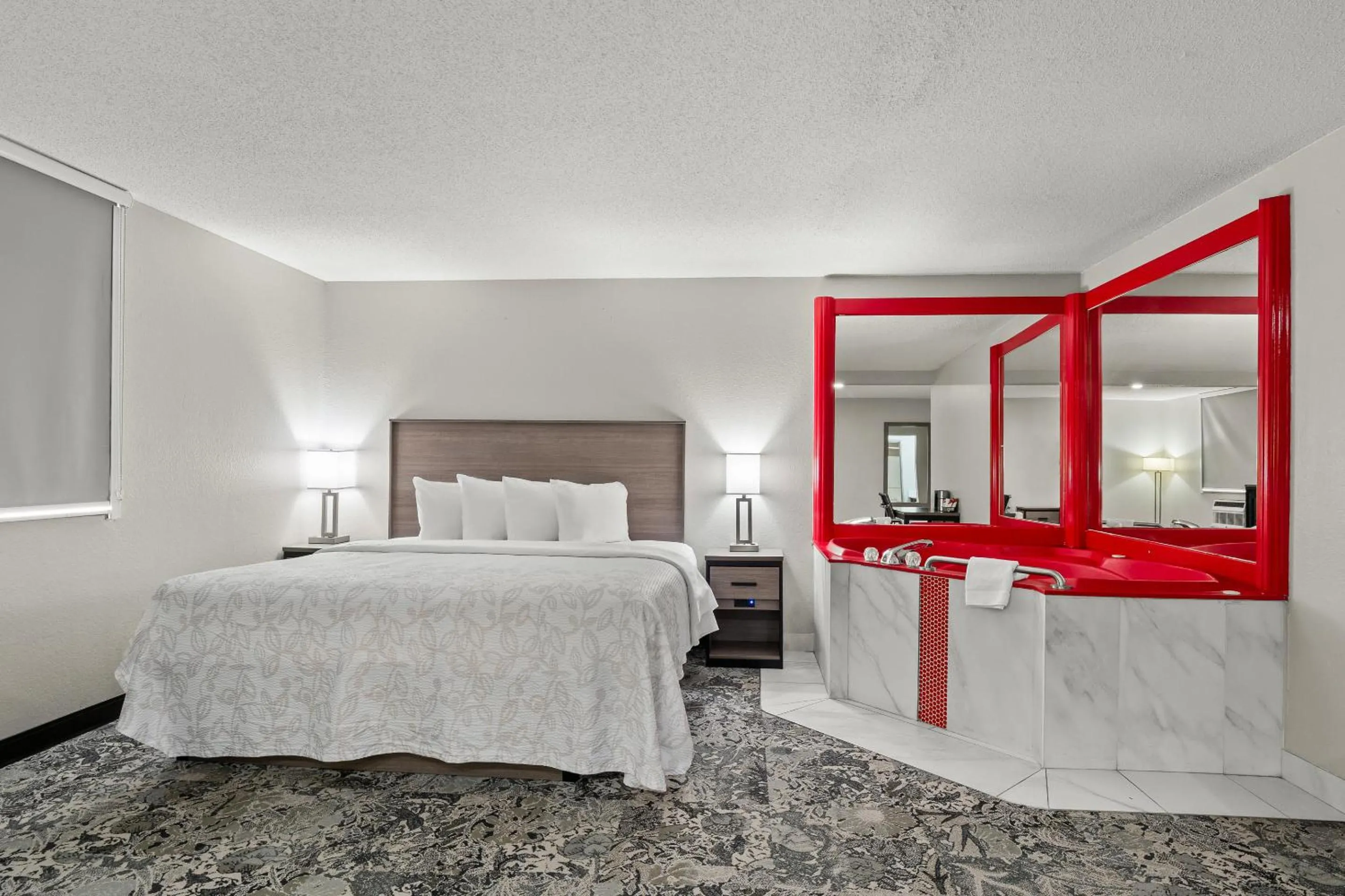 Premium King Room with Jetted Tub Smoke Free Upgraded Bedding and Snack Box)  in Red Roof PLUS Belleville