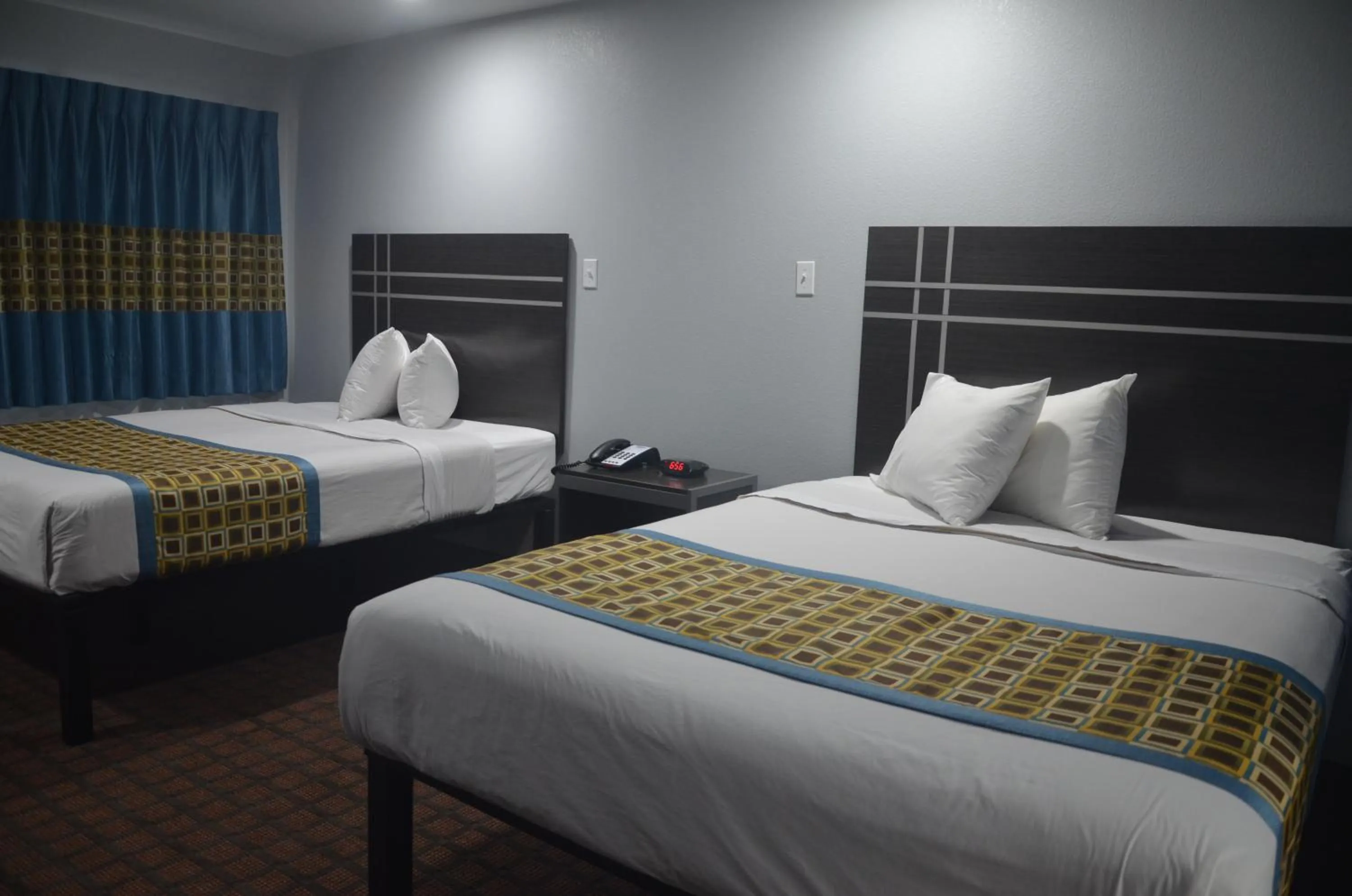 Queen Room with Two Queen Beds in Travelers Inn