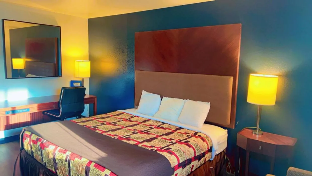 Queen Room with Two Queen Beds - Non-Smoking in Rodeway Inn