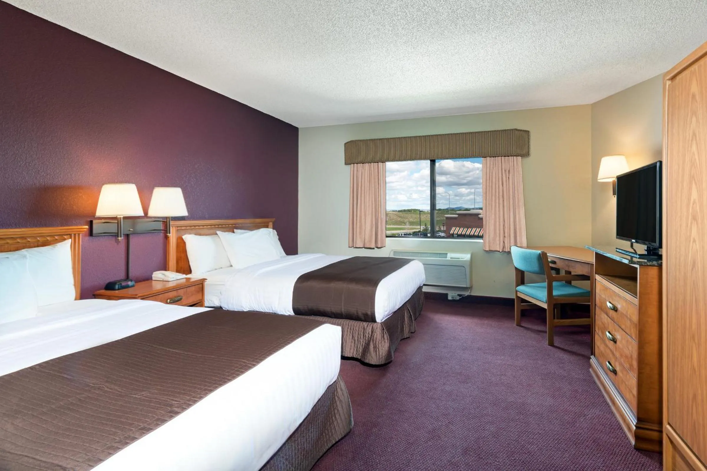 Queen Room with Two Queen Beds - Pet Friendly/Non-Smoking in AmericInn by Wyndham Rexburg BYUI