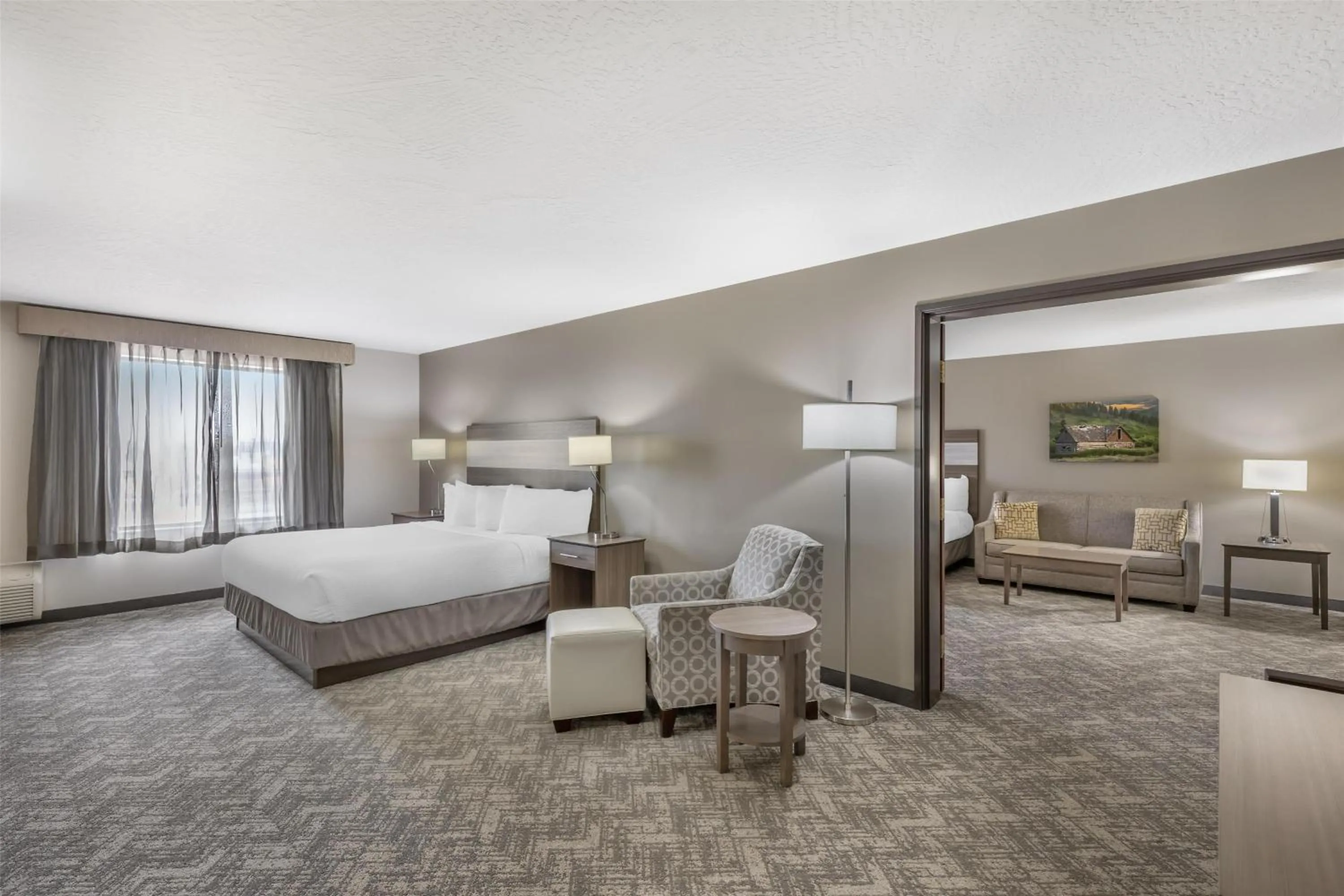 Suite with One King Bed and Two Queen Beds in Best Western Plus Great Northern Inn