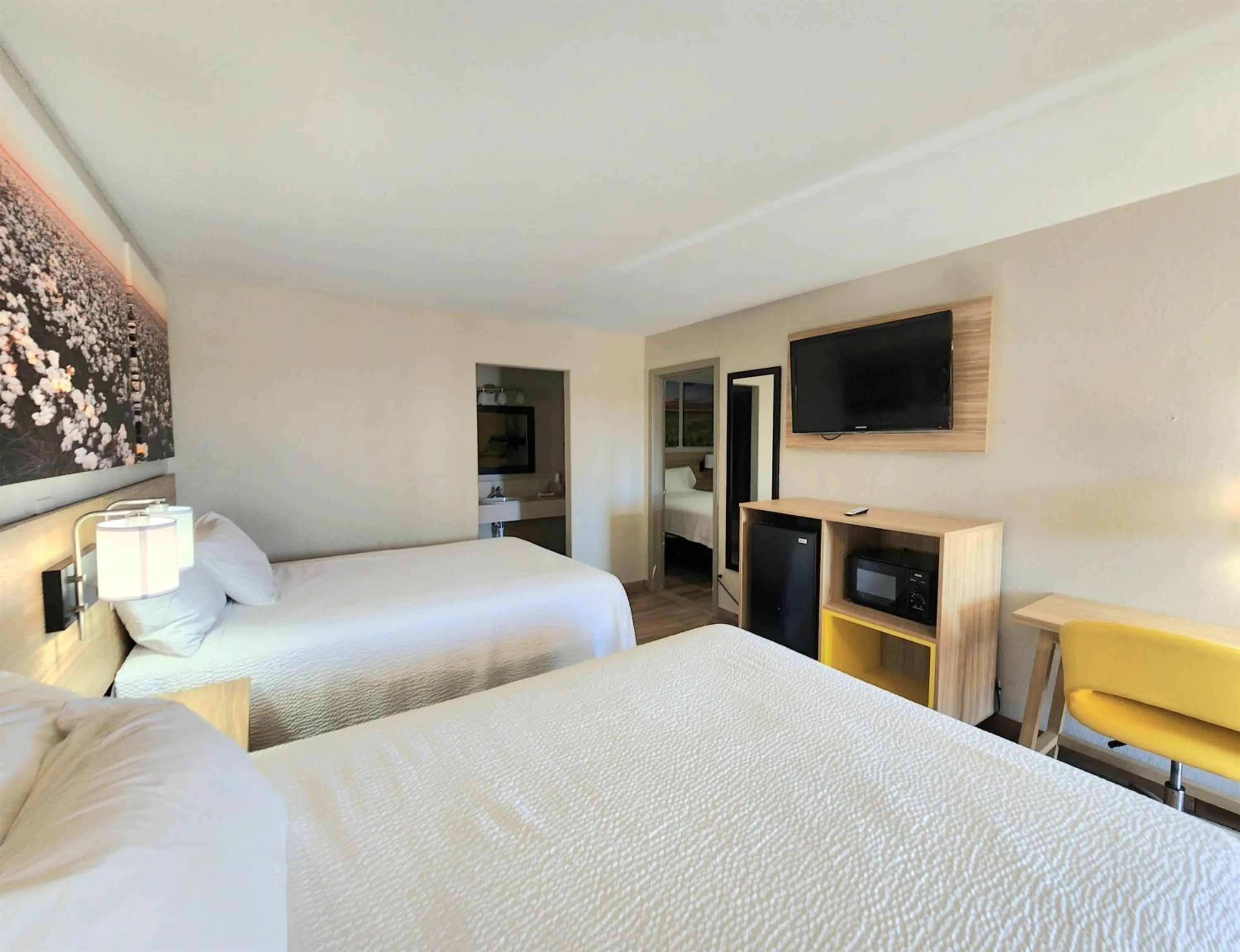 Double Room with Three Double Beds - Smoking in Days Inn by Wyndham McAllen