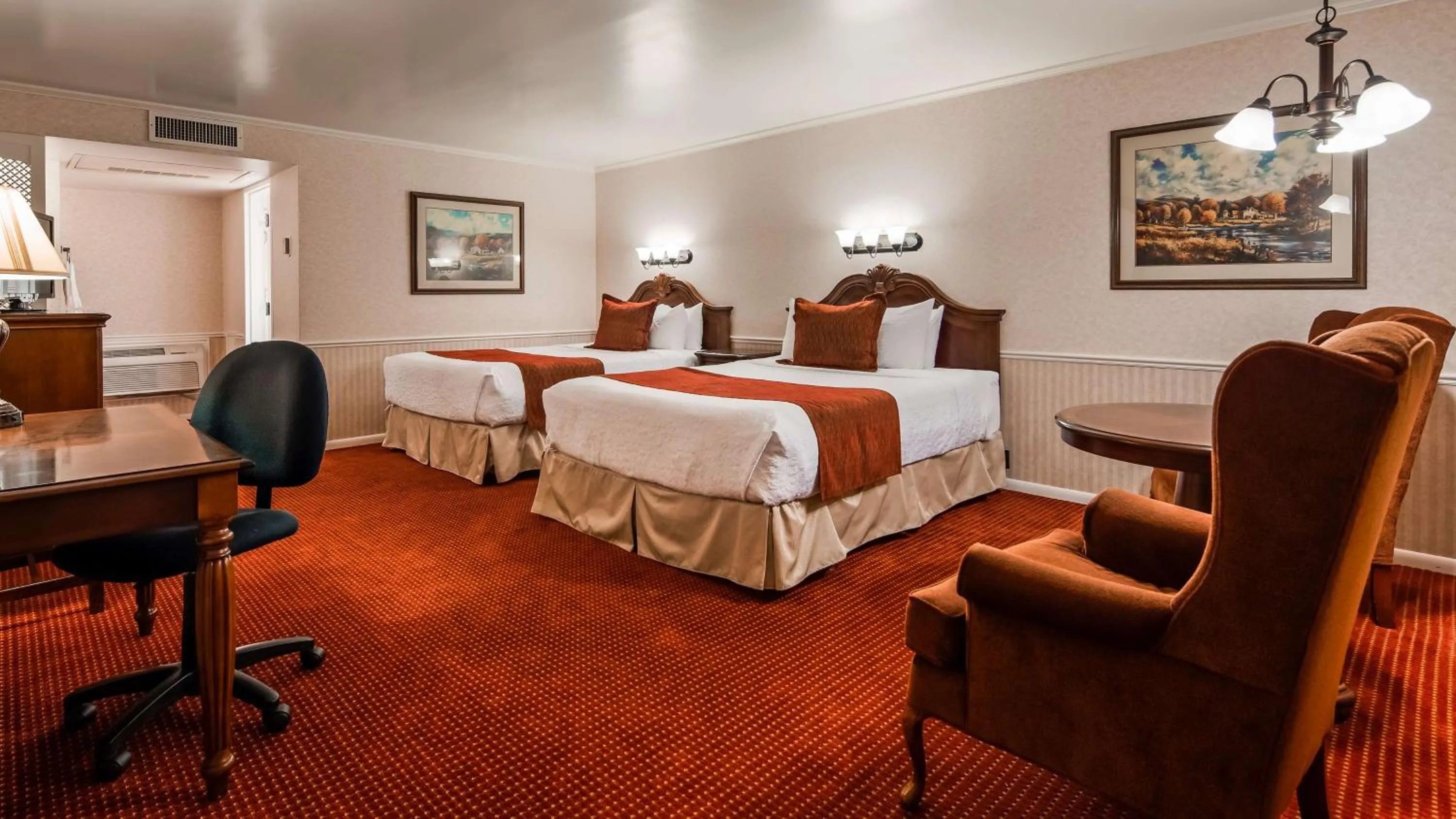 Deluxe Queen Room with Two Queen Beds - Non-Smoking in Baugh Motel, SureStay Collection by Best Western