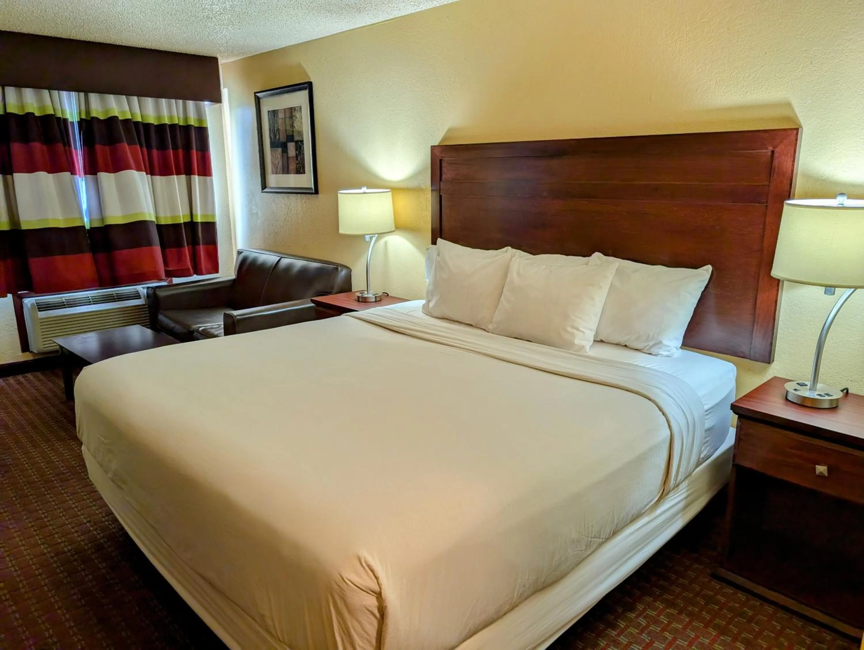 King Room with Roll-In Shower - Mobility/Hearing  Accessible - Non-Smoking in Travelodge by Wyndham Enid