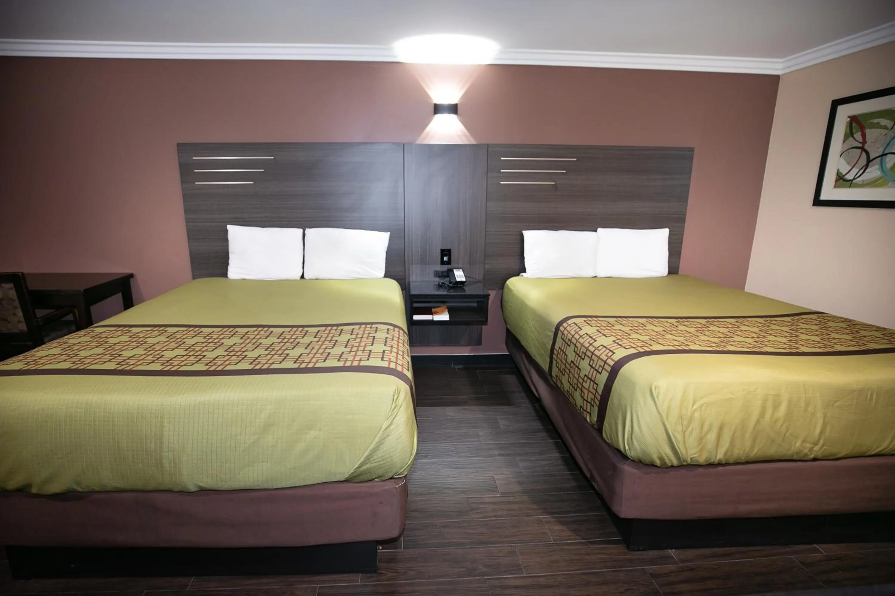 Standard Queen Room with Two Queen Beds - single occupancy - Non Smoking  in Rodeway Inn & Suites
