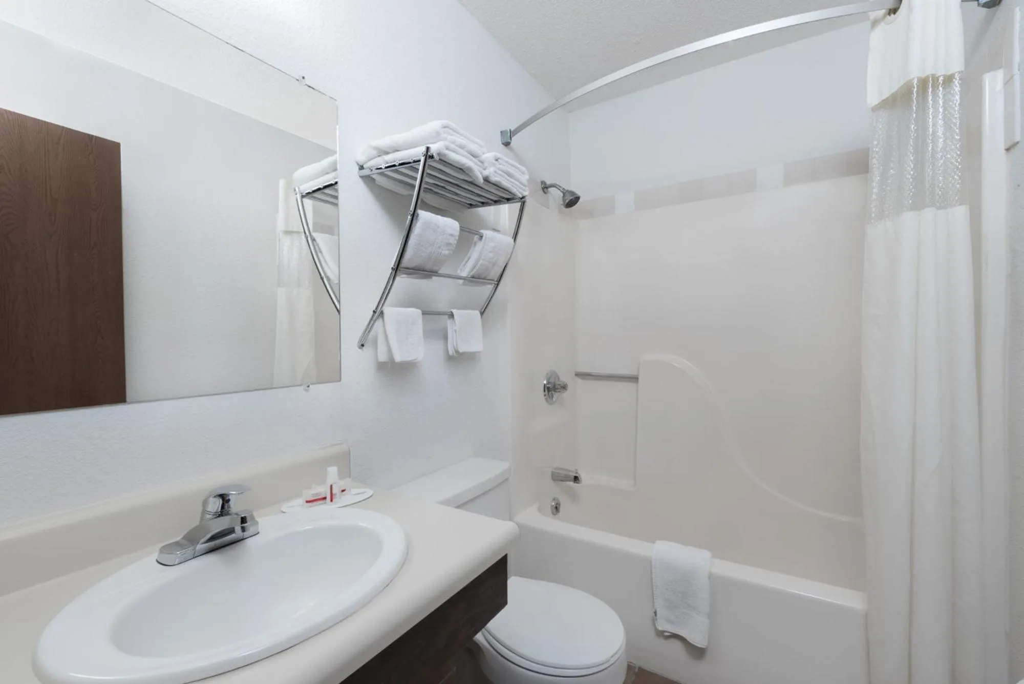 Superior Queen Studio with Three Queen Beds - Non-Smoking in Super 8 by Wyndham Winner SD