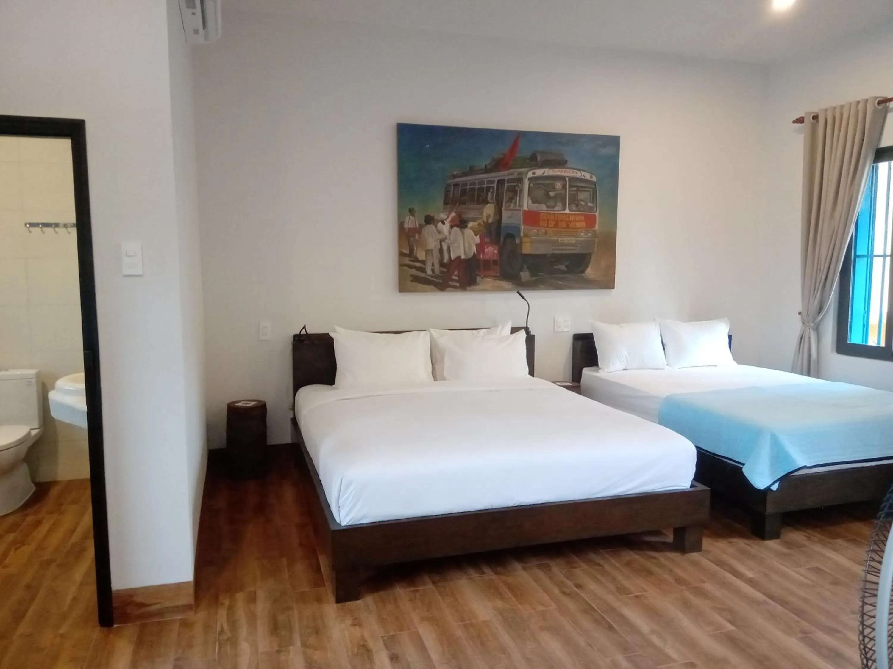 Deluxe Quadruple Room with Balcony - single occupancy - Top Floor in MiNhon Hotel Muine