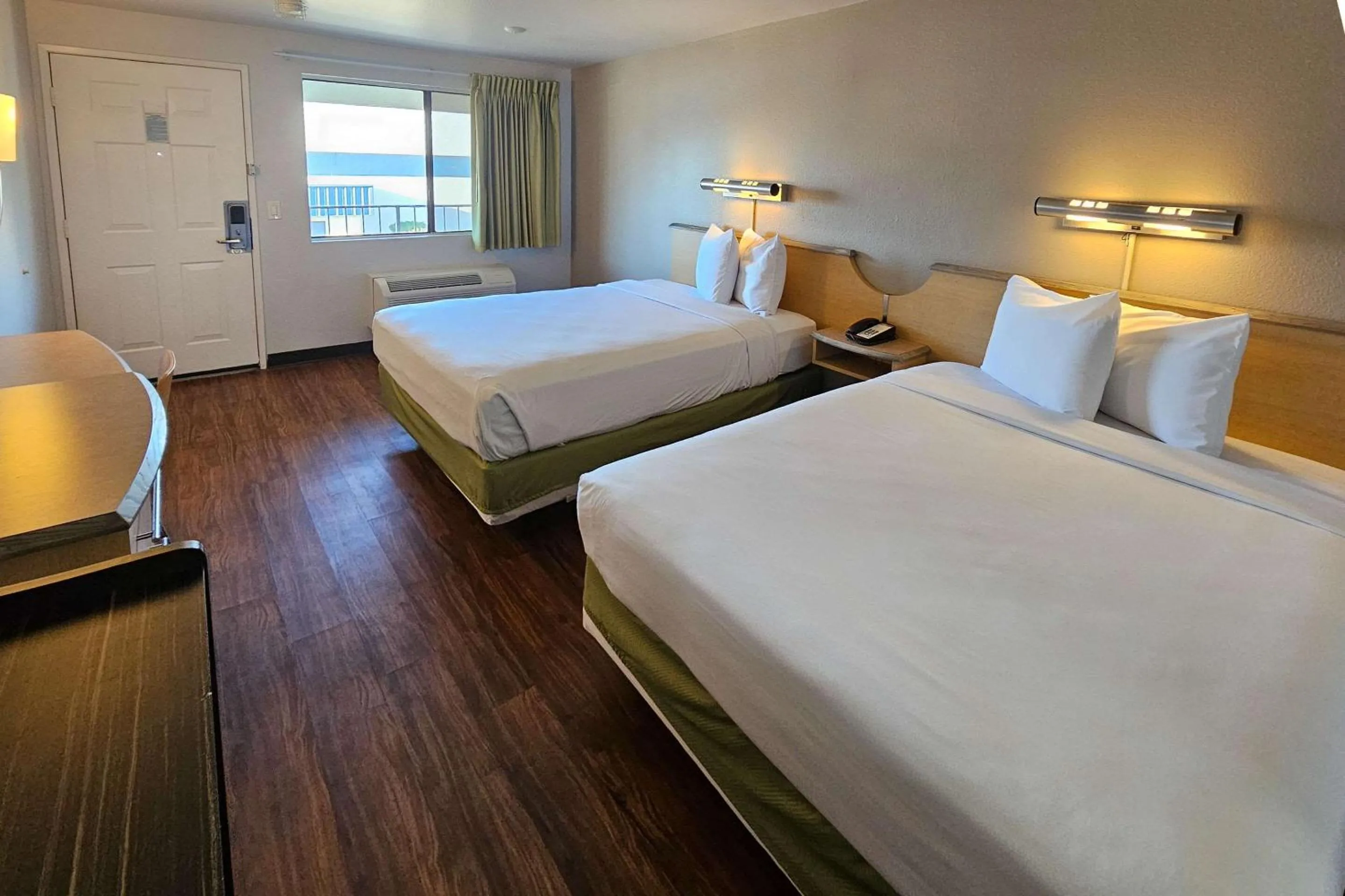 Quadruple Room with Two Queen Beds and Roll-In Shower - Disability Access/Non Smoking in Rodeway Inn & Suites Thousand Palms - Rancho Mirage