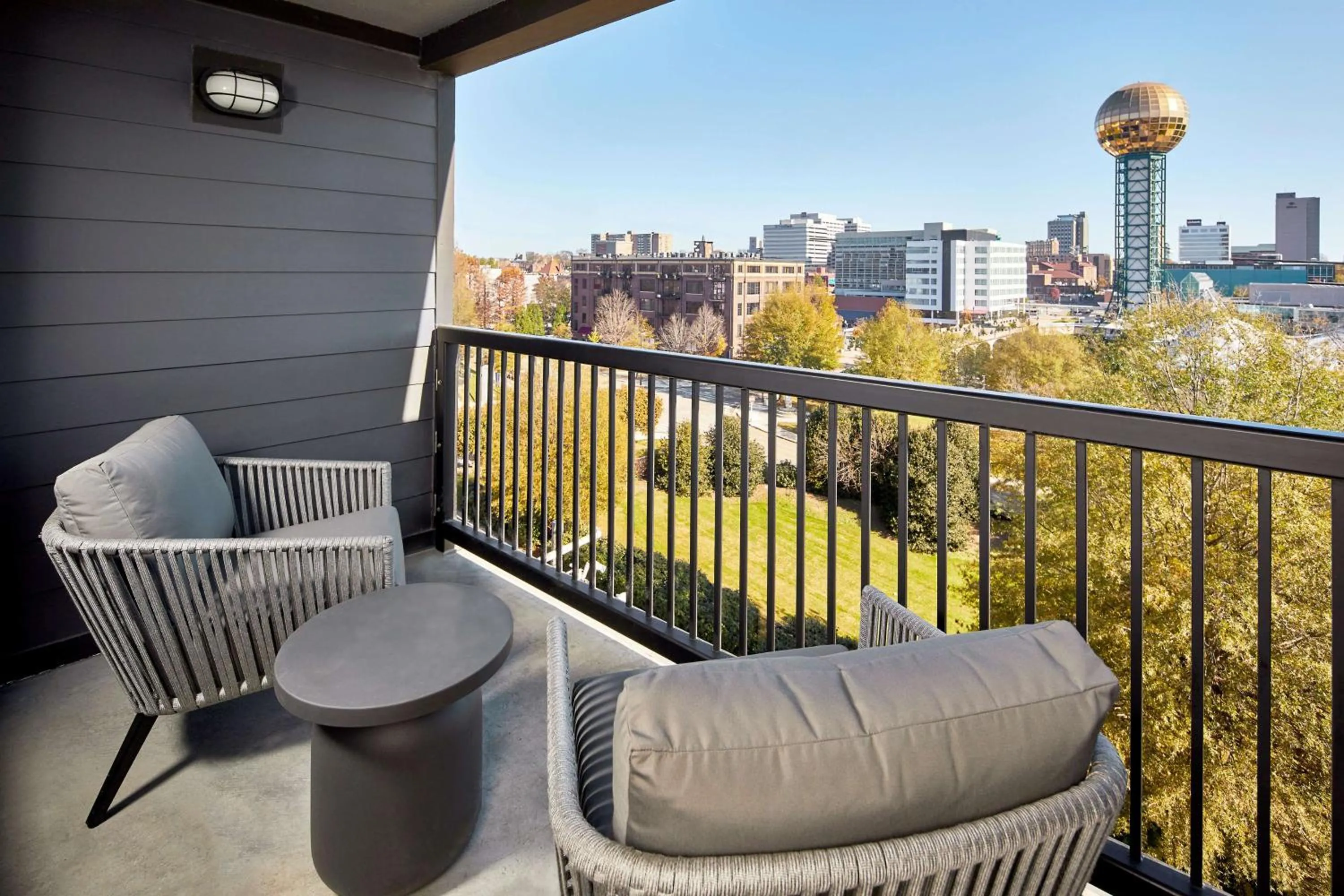 One-Bedroom King Suite with Balcony in Cumberland House Knoxville, Tapestry Collection by Hilton