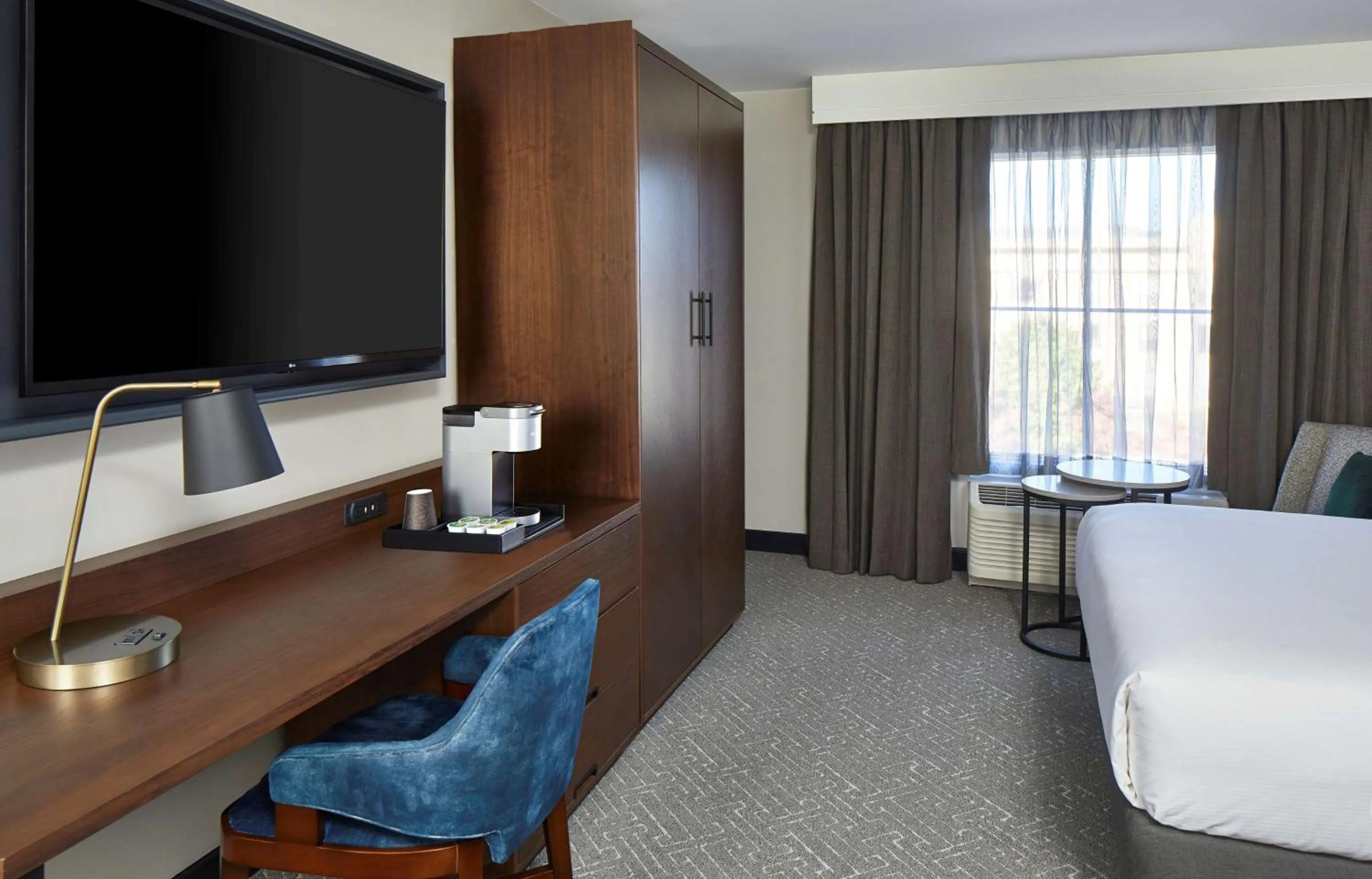 Queen Room with Two Queen Beds and Mobility Accessible Tub in Cumberland House Knoxville, Tapestry Collection by Hilton