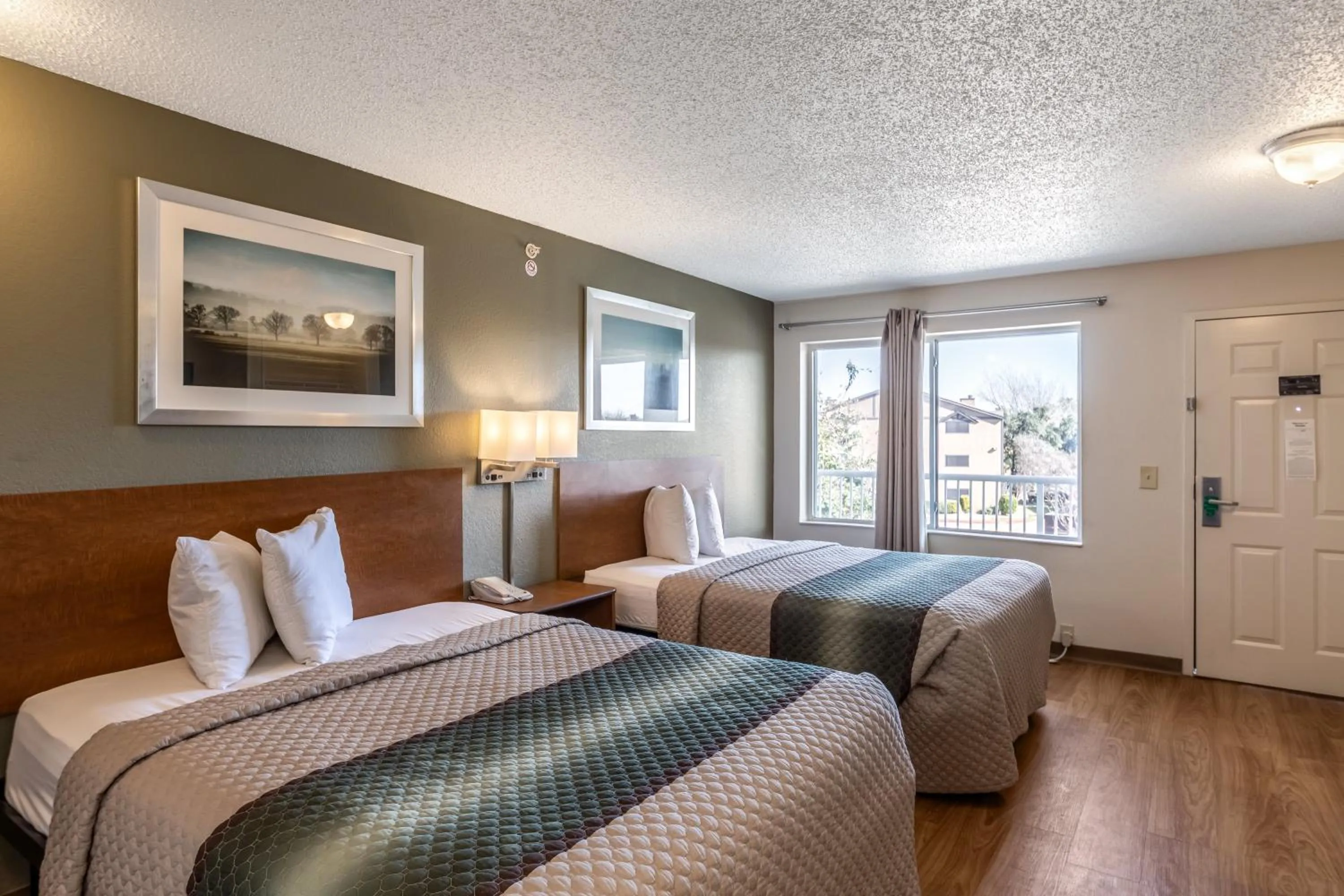 Studio Room with Two Queen Beds Non-Smoking in HomeTowne Studios by Red Roof Austin