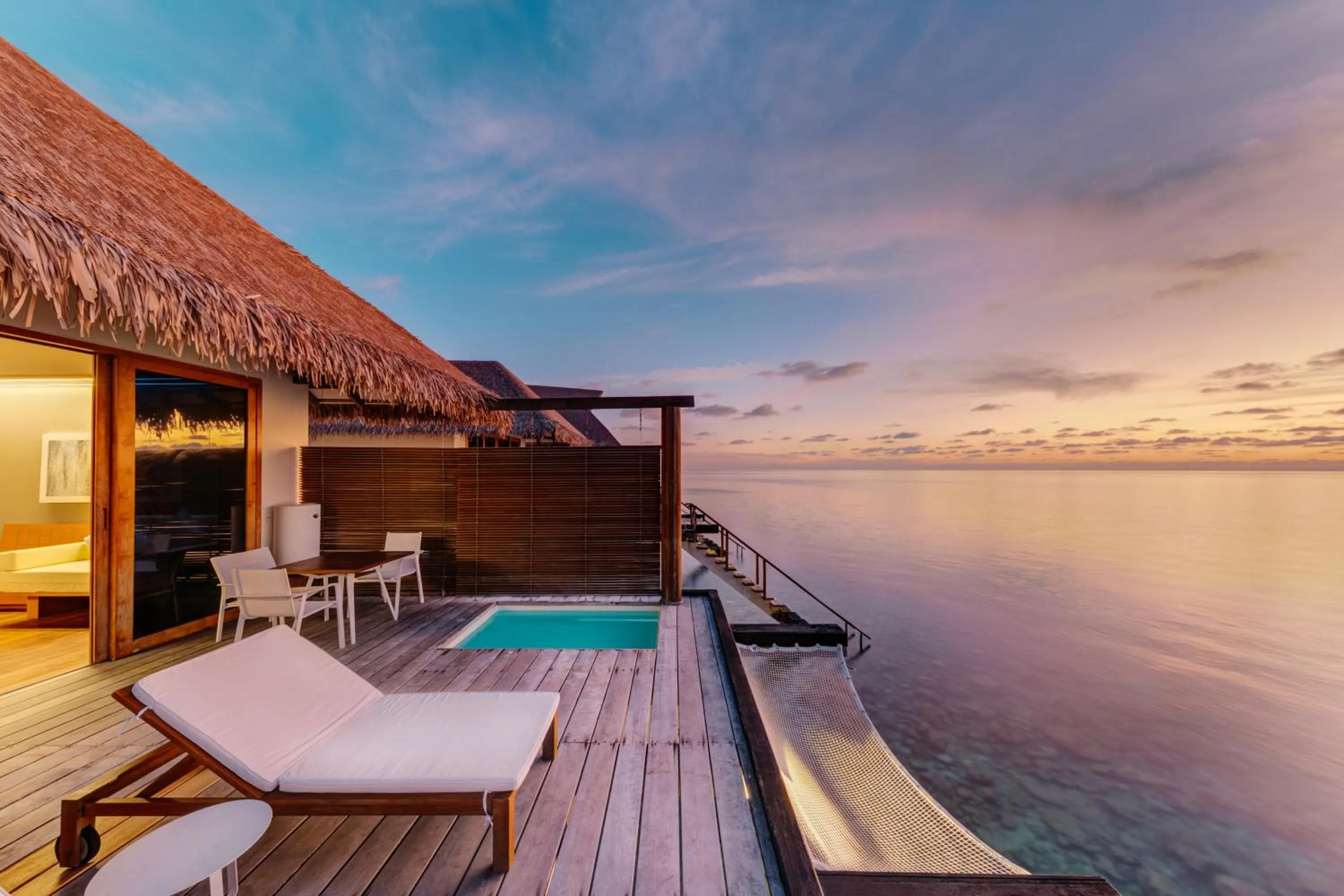 Sunset Water Bungalow with Jacuzzi - single occupancy - One-way FREE speedboat Transfers | Valid for book dates & stay dates starting 1st October 2025 in Cinnamon Velifushi Maldives - Free One-Way Speedboat and 02 Kids Under 12 Stay & Dine Free