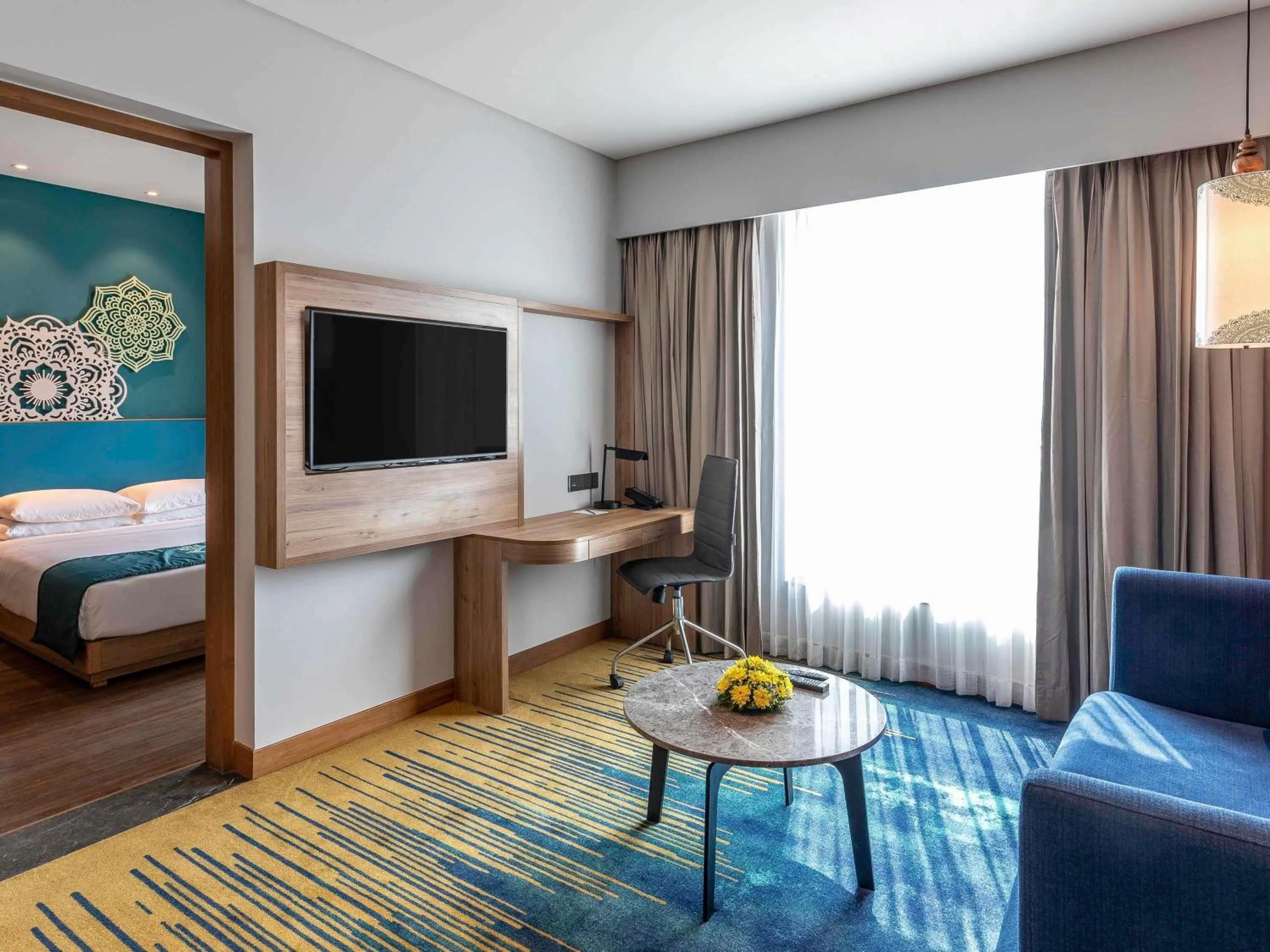 Classic Suite with Balcony ( 15% Discount on food &soft beverages and Spa) in Grand Mercure Ahmedabad GIFT City - An Accor Hotels Brand