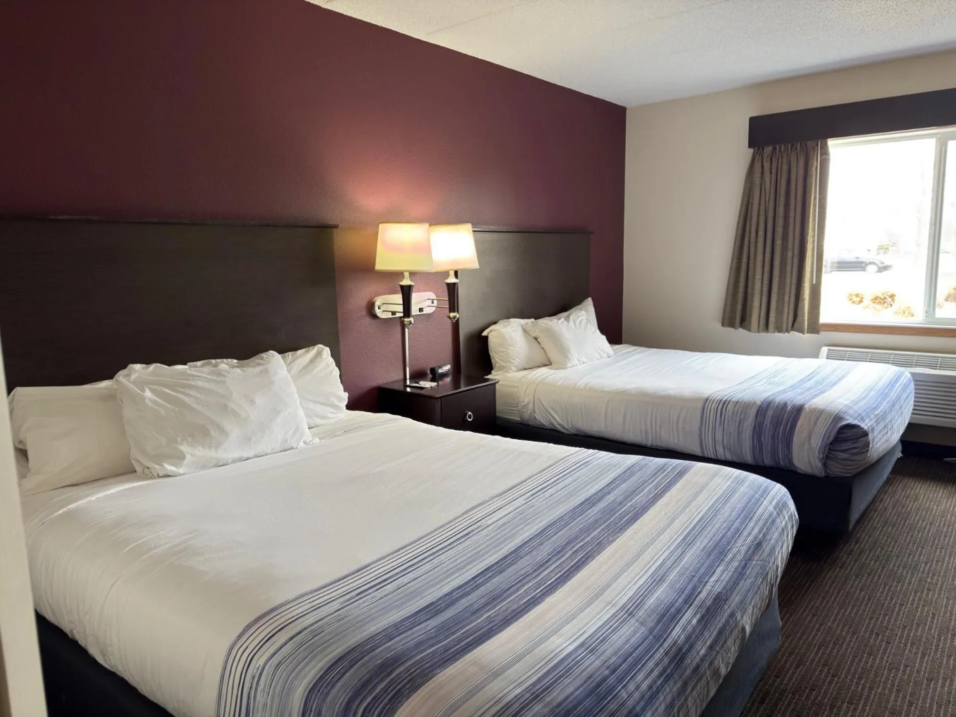 Queen Room with Two Queen Beds - Non-Smoking in AmericInn by Wyndham Northfield