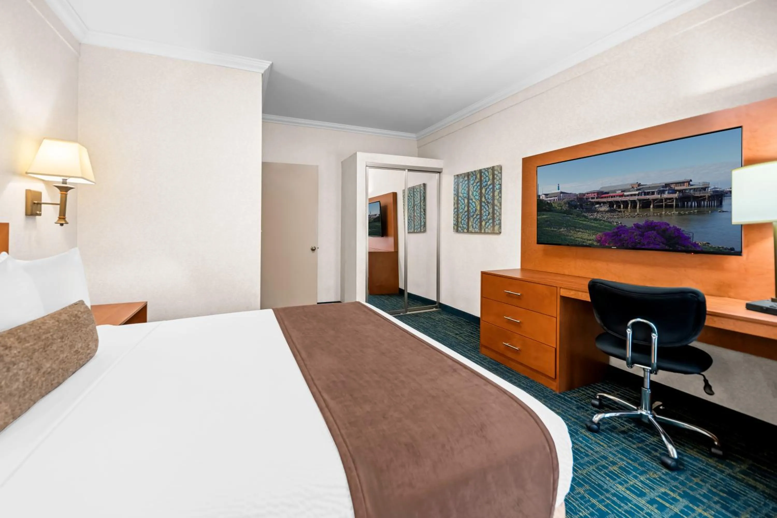 Suite Room with Three Queen Beds in Best Western De Anza Inn