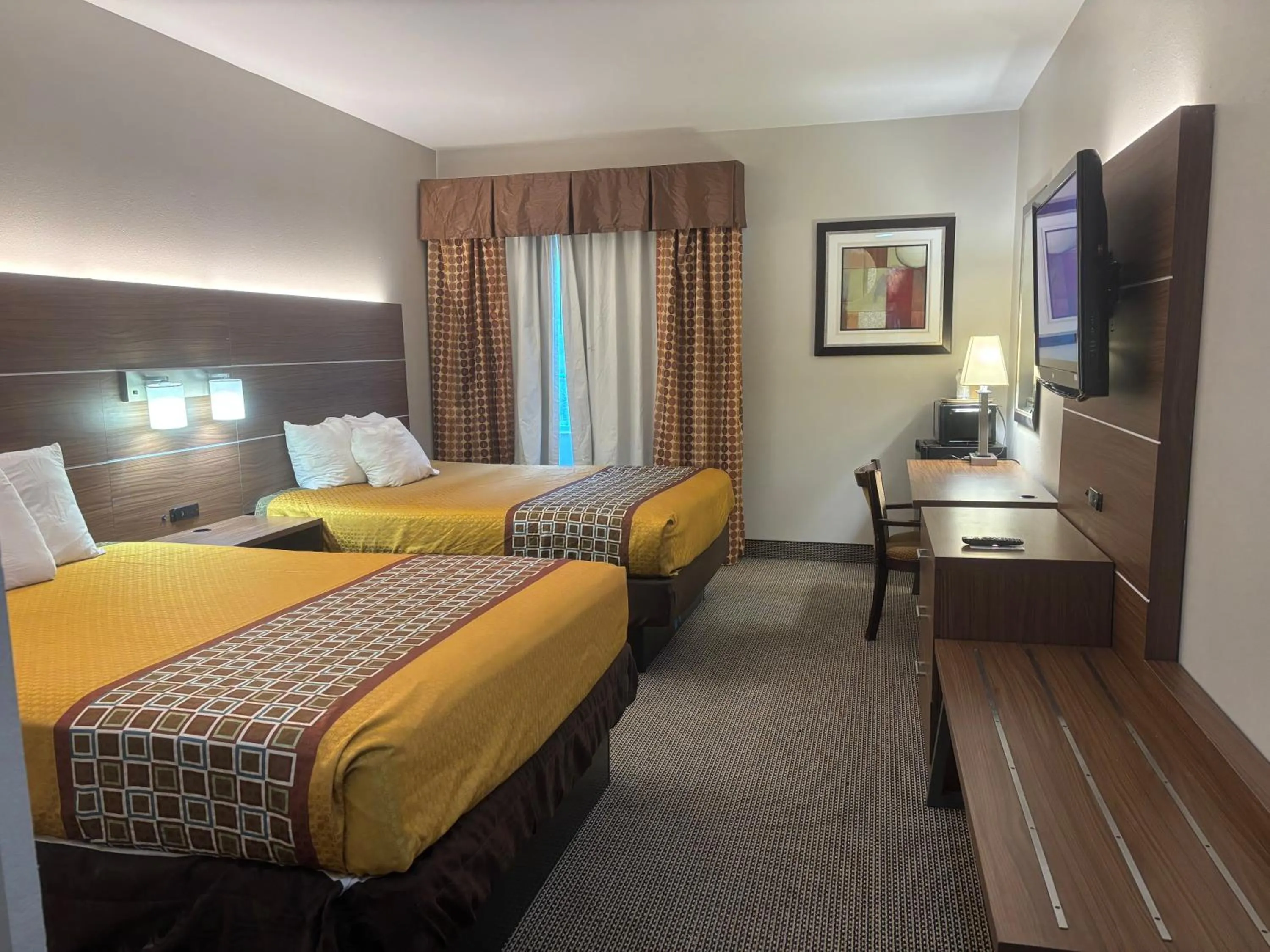 Queen Room with Two Queen Beds - Smoking in Rodeway Inn & Suites Winnfield