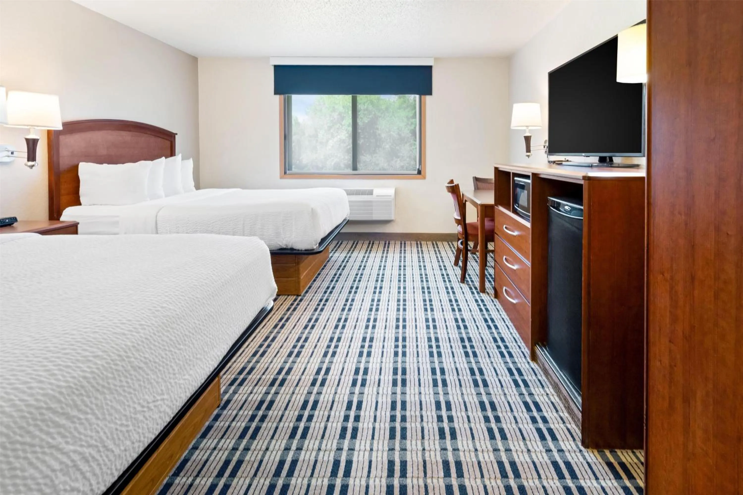 Queen Room with Two Queen Beds - Non-Smoking in AmericInn by Wyndham Dickinson