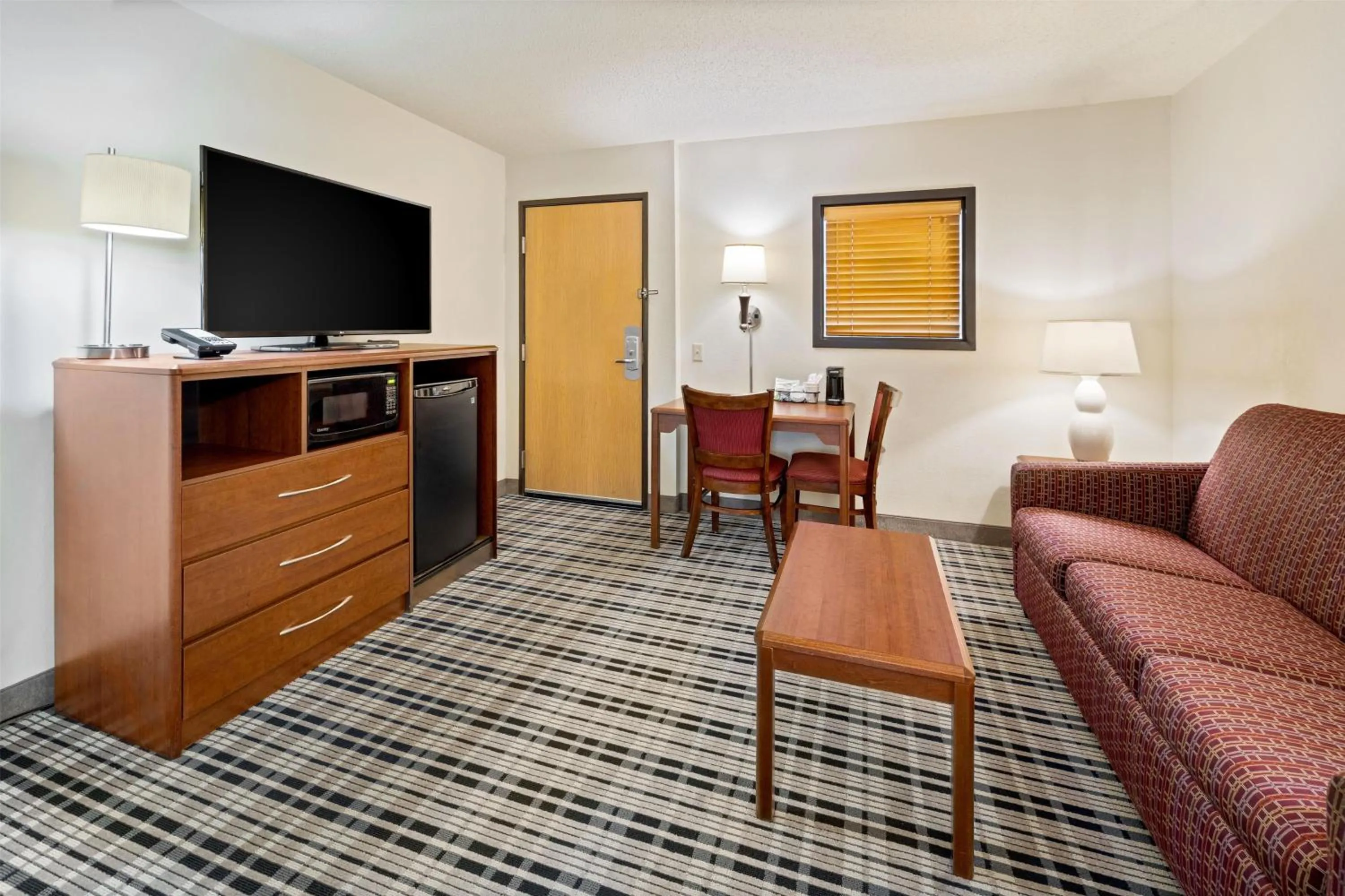 One-Bedroom King Suite - Non-Smoking in AmericInn by Wyndham Dickinson