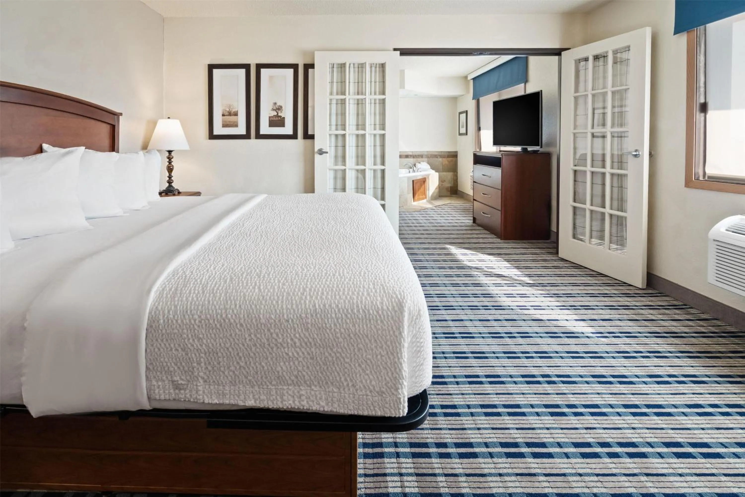 One-Bedroom Deluxe King Suite - Non-Smoking in AmericInn by Wyndham Dickinson