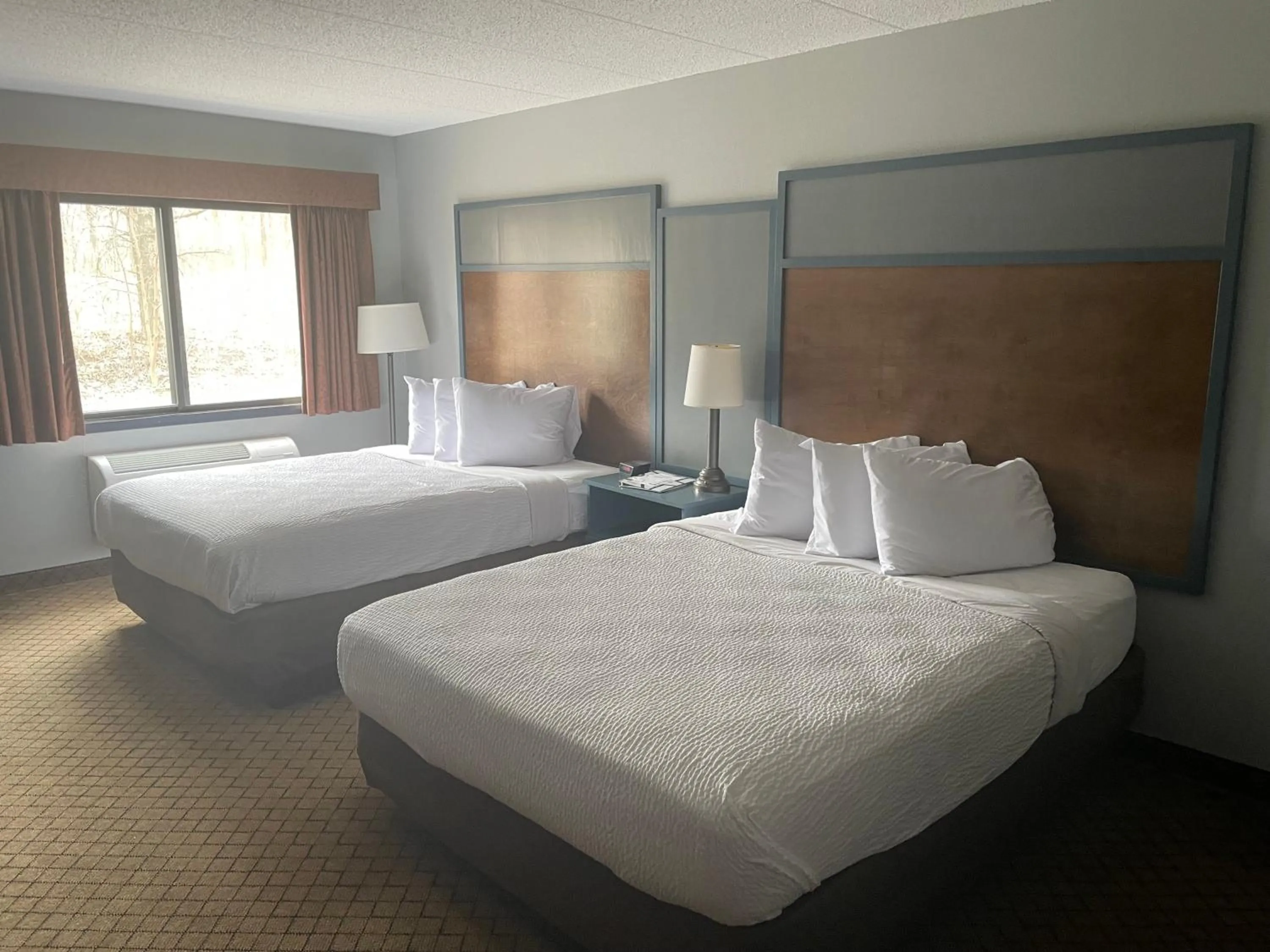 Queen Room with Two Queen Beds - Non-Smoking in AmericInn by Wyndham Hartford WI