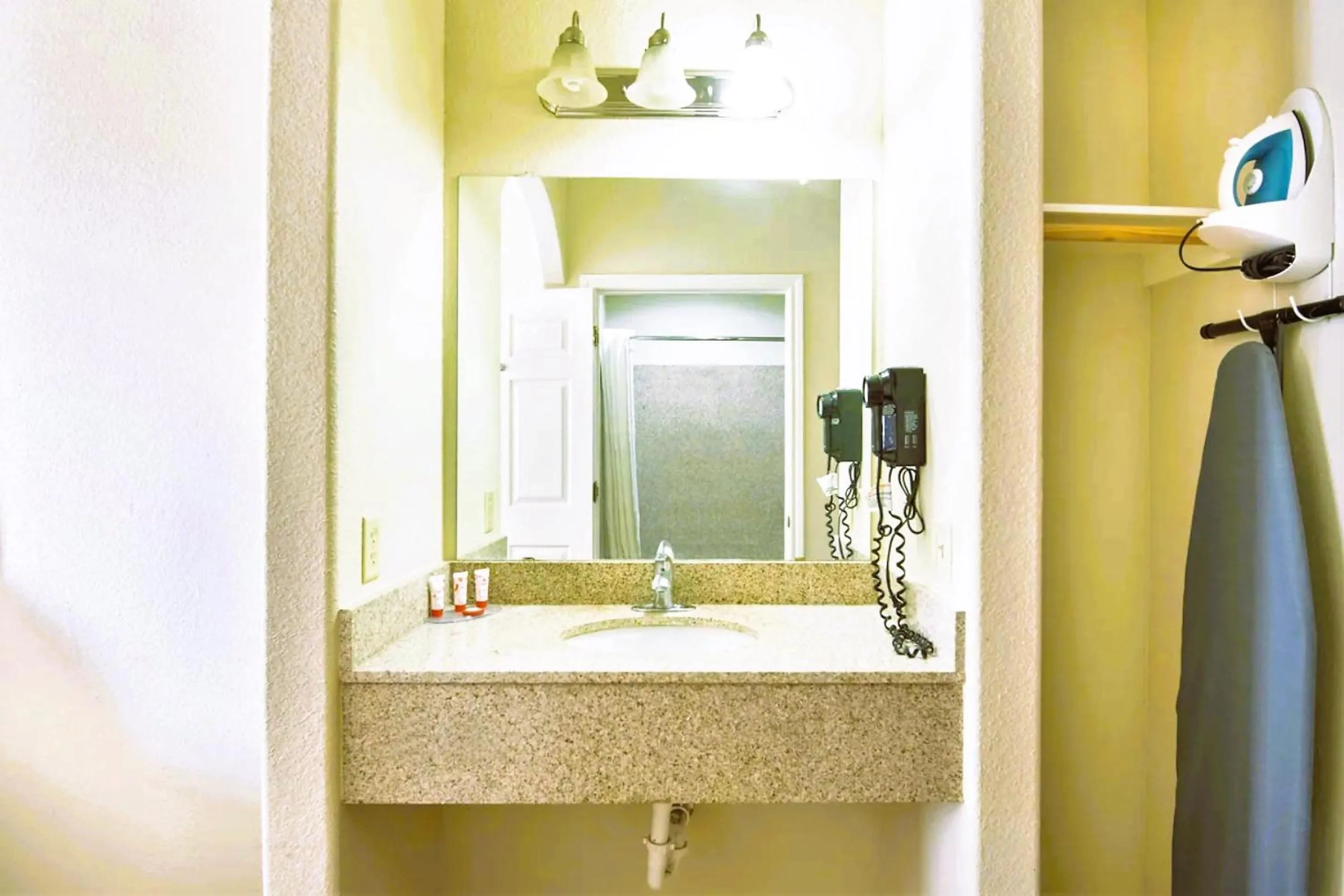 Premium King Bed with Pull Out in OYO Townhouse Clute Lake Jackson