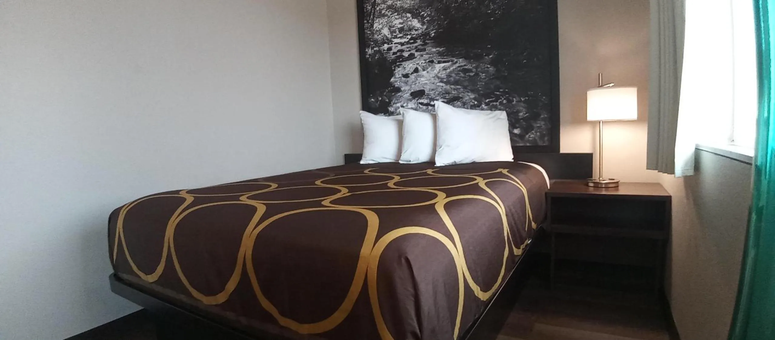 Studio Suite with Three Queen Beds - Non-Smoking in Super 8 by Wyndham Greeley